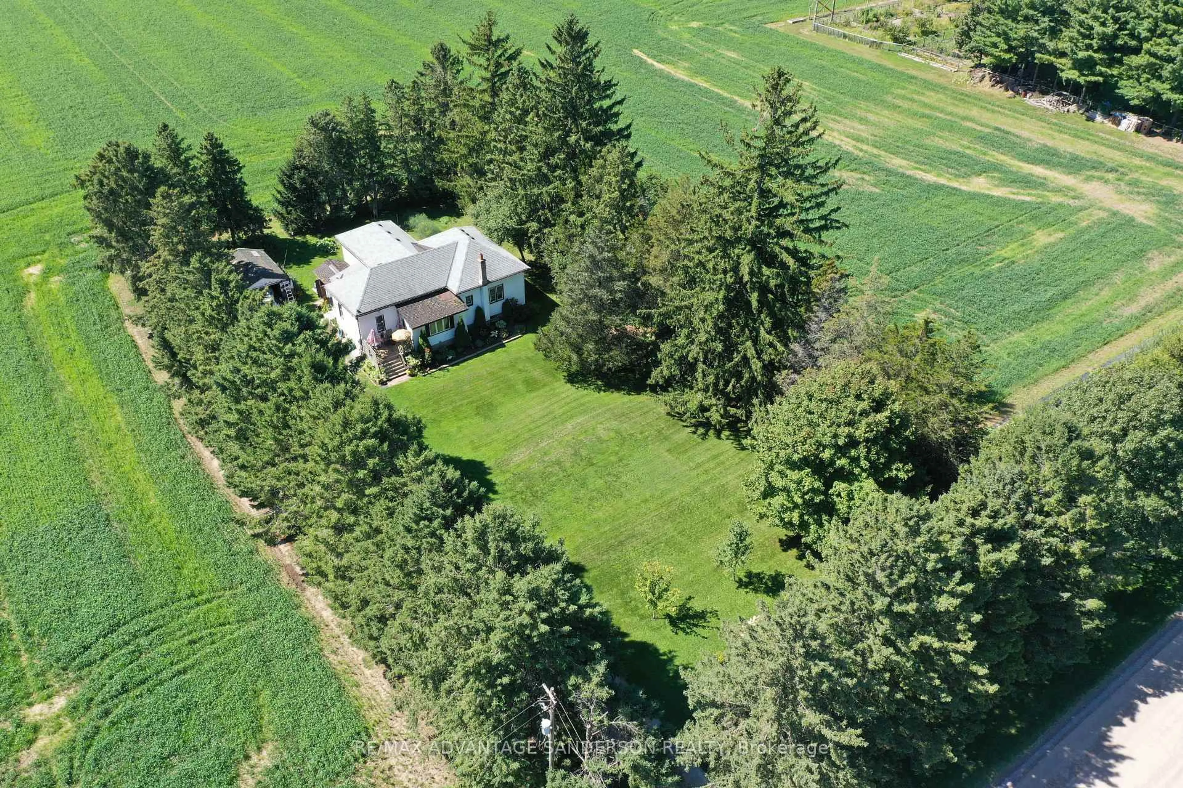 A pic from outside/outdoor area/front of a property/back of a property/a pic from drone, unknown for 24441 Bear Creek Rd, Middlesex Centre Ontario N0M 2A0