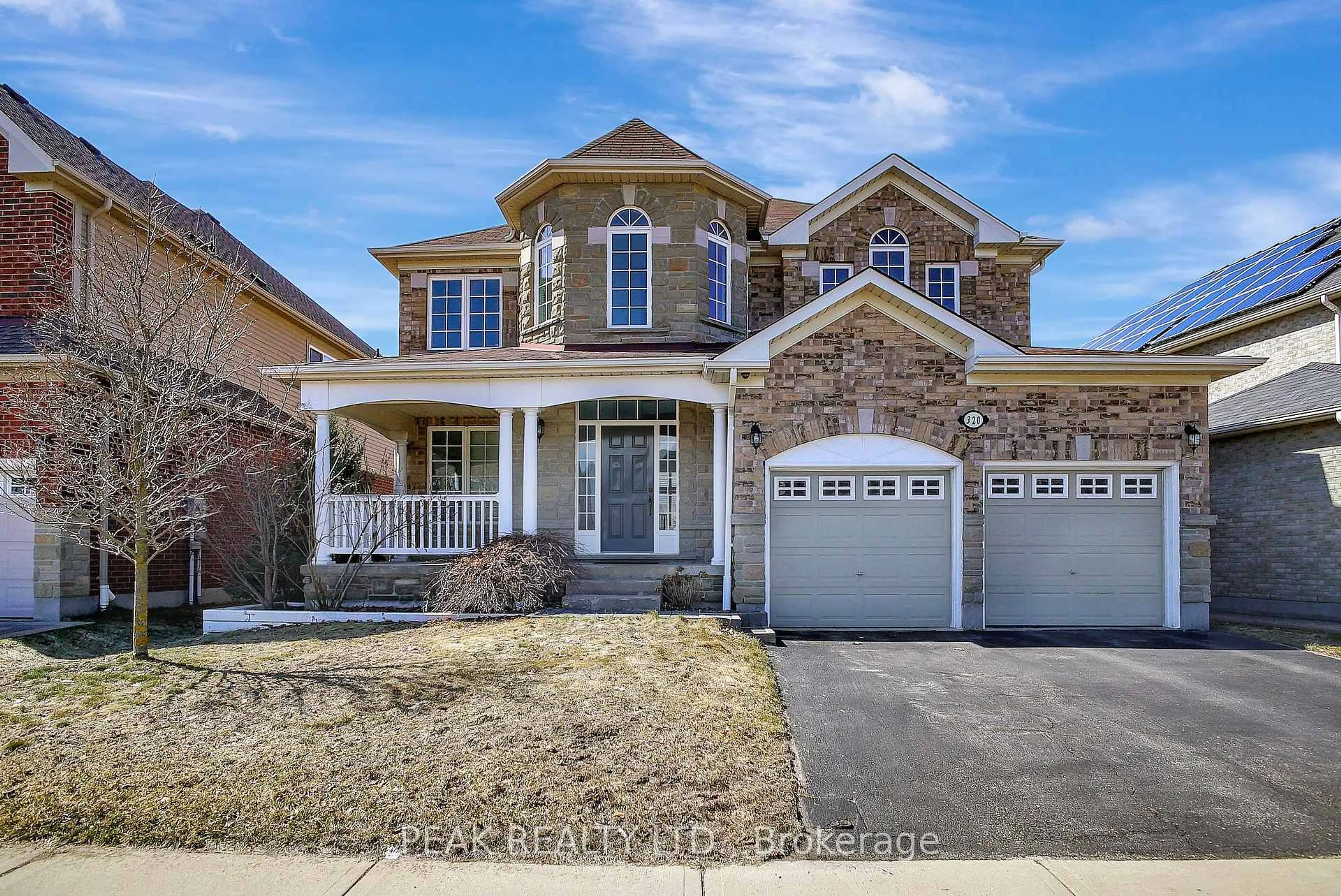 Home with brick exterior material, street for 320 Robert Ferrie Dr, Kitchener Ontario N2P 2Y7