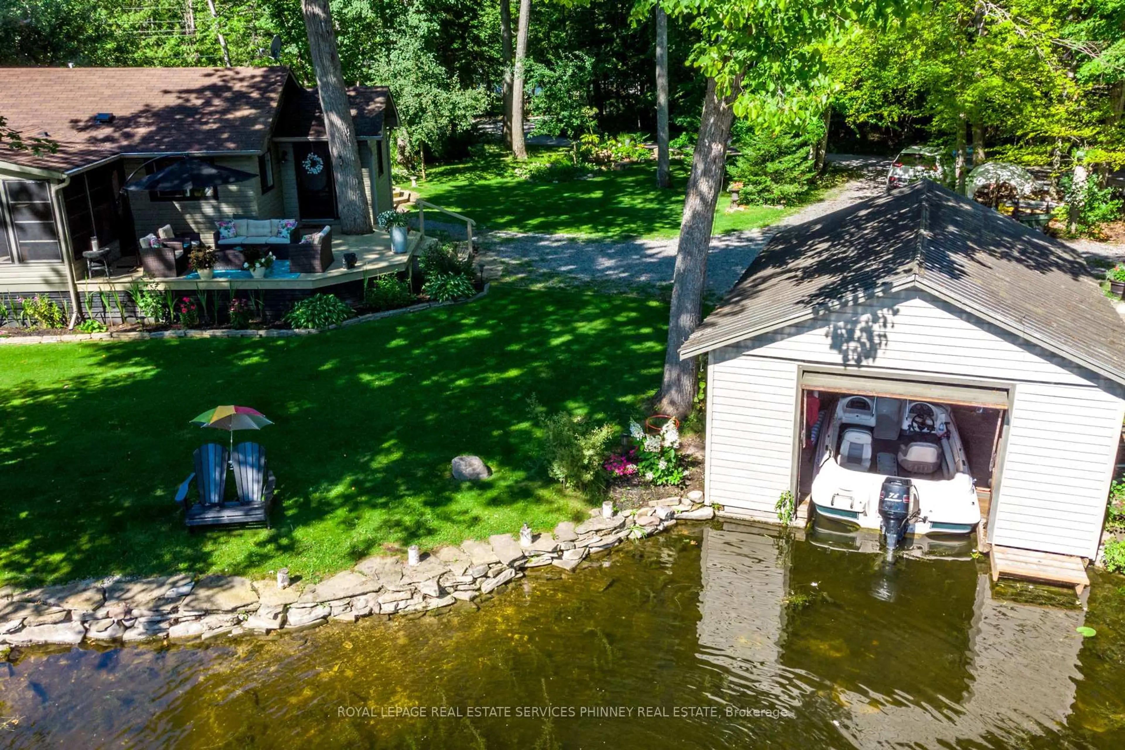 A pic from outside/outdoor area/front of a property/back of a property/a pic from drone, water/lake/river/ocean view for 4 Fire Route 103C Rd, Galway-Cavendish and Harvey Ontario K0M 1A0