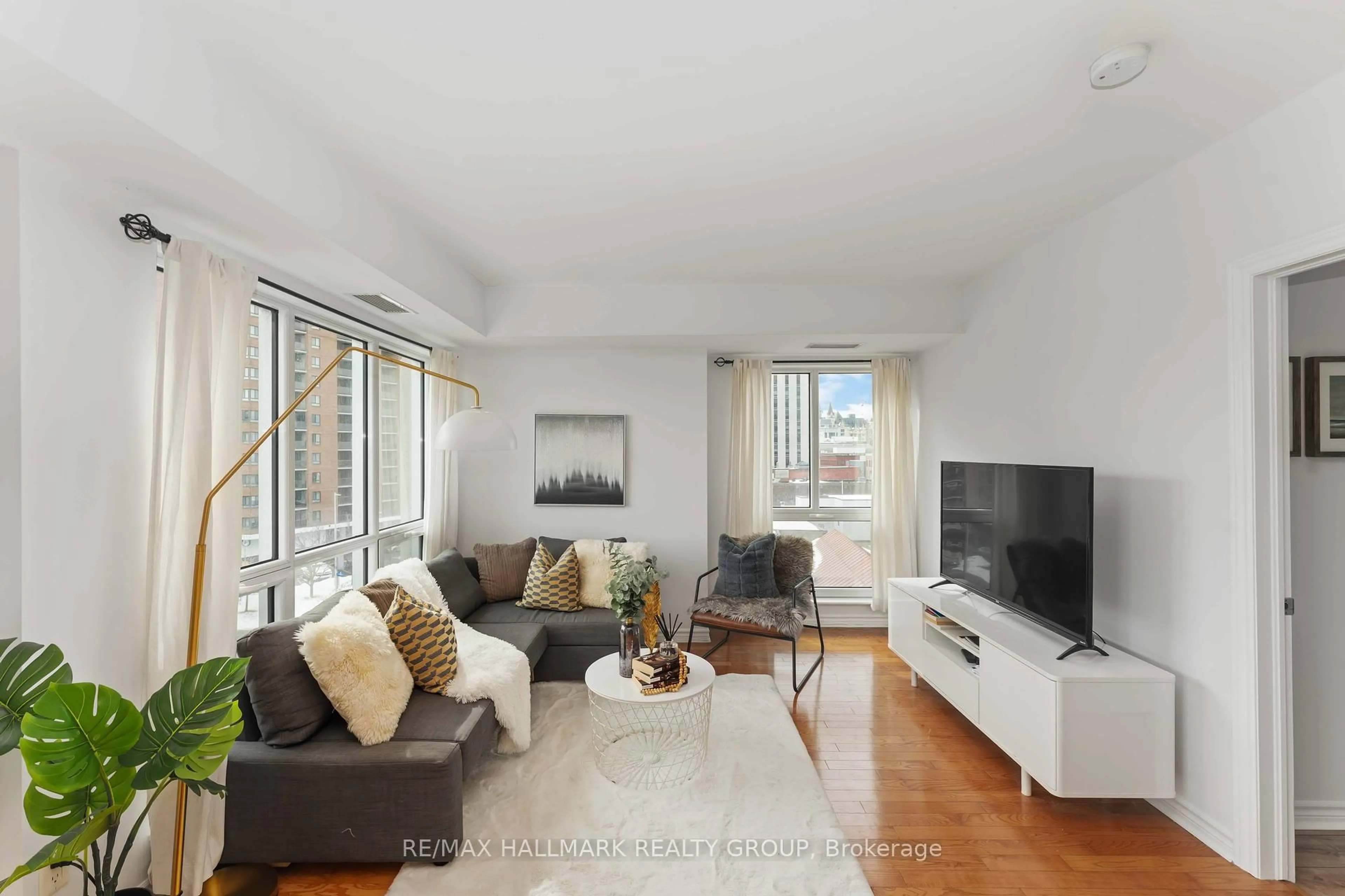 Living room with furniture, unknown for 200 Rideau St #608, Ottawa Ontario K1N 5Y1