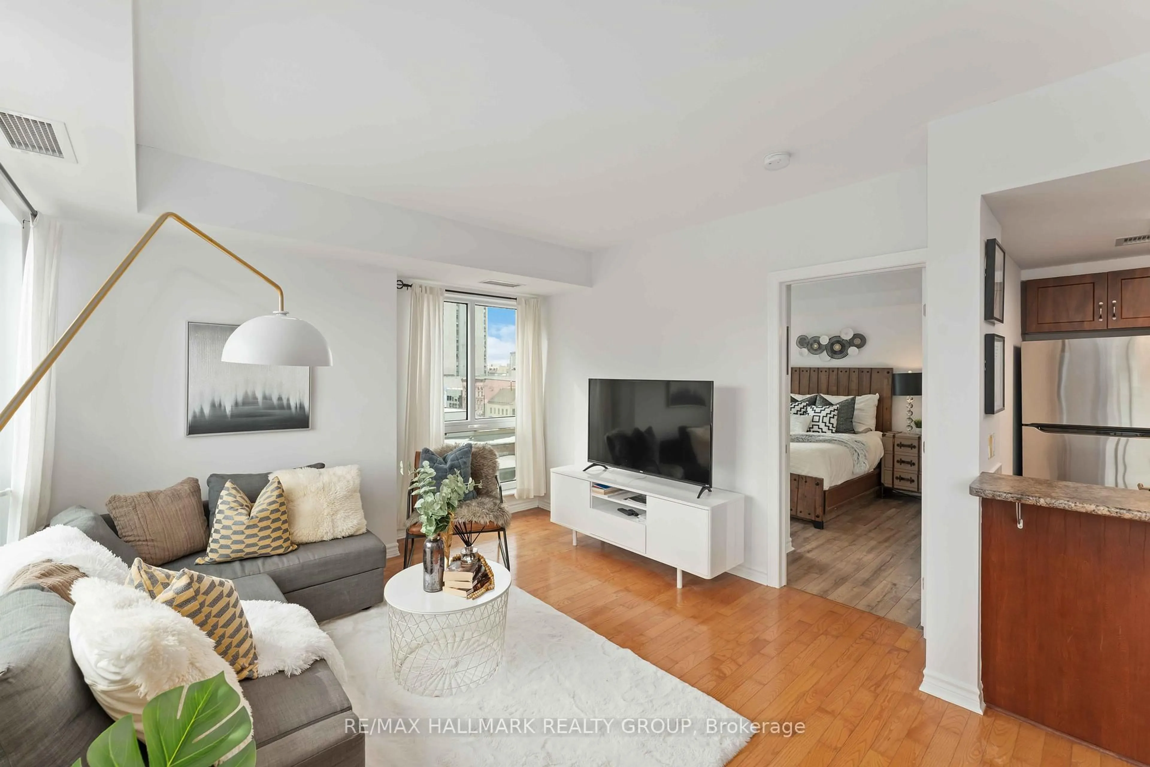 Living room with furniture, unknown for 200 Rideau St #608, Ottawa Ontario K1N 5Y1