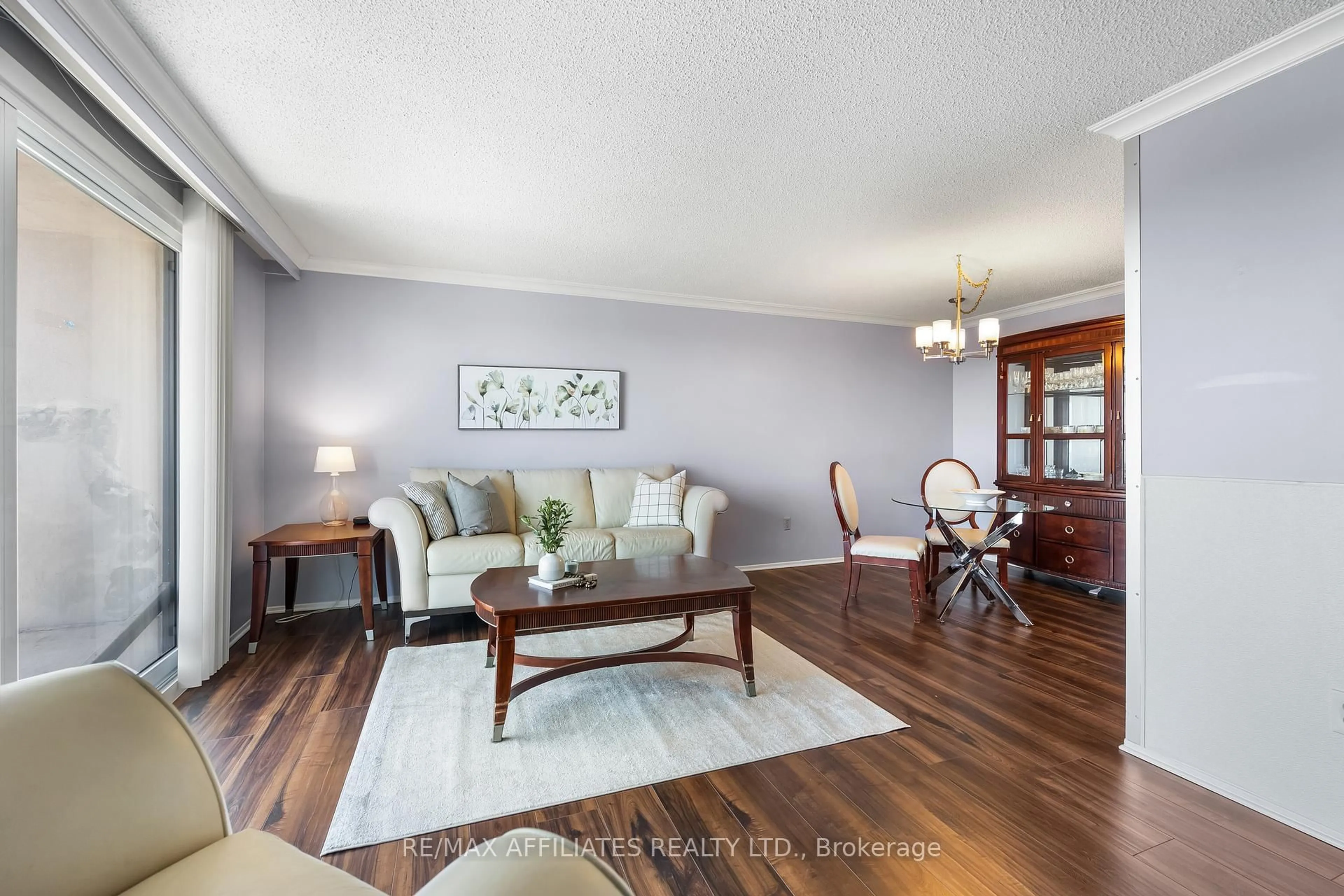 Living room with furniture, wood/laminate floor for 2305-1025 RICHMOND Rd, Ottawa Ontario K2B 8G8