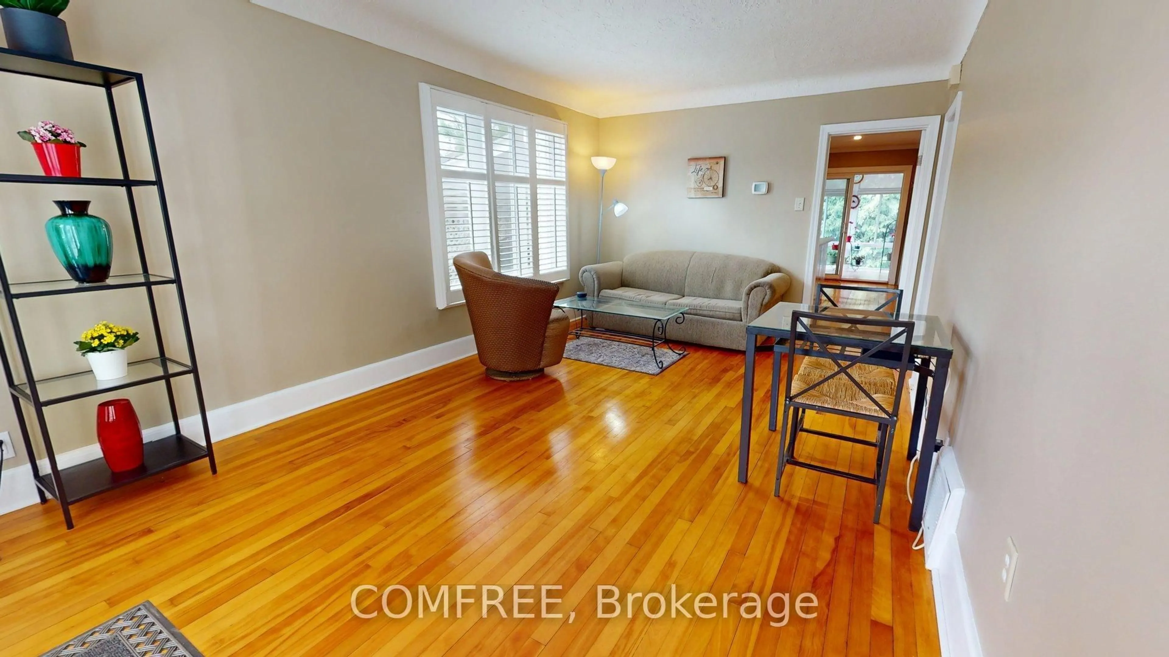 Living room with furniture, wood/laminate floor for 180 Britannia Rd, Ottawa Ontario K2B 5W9