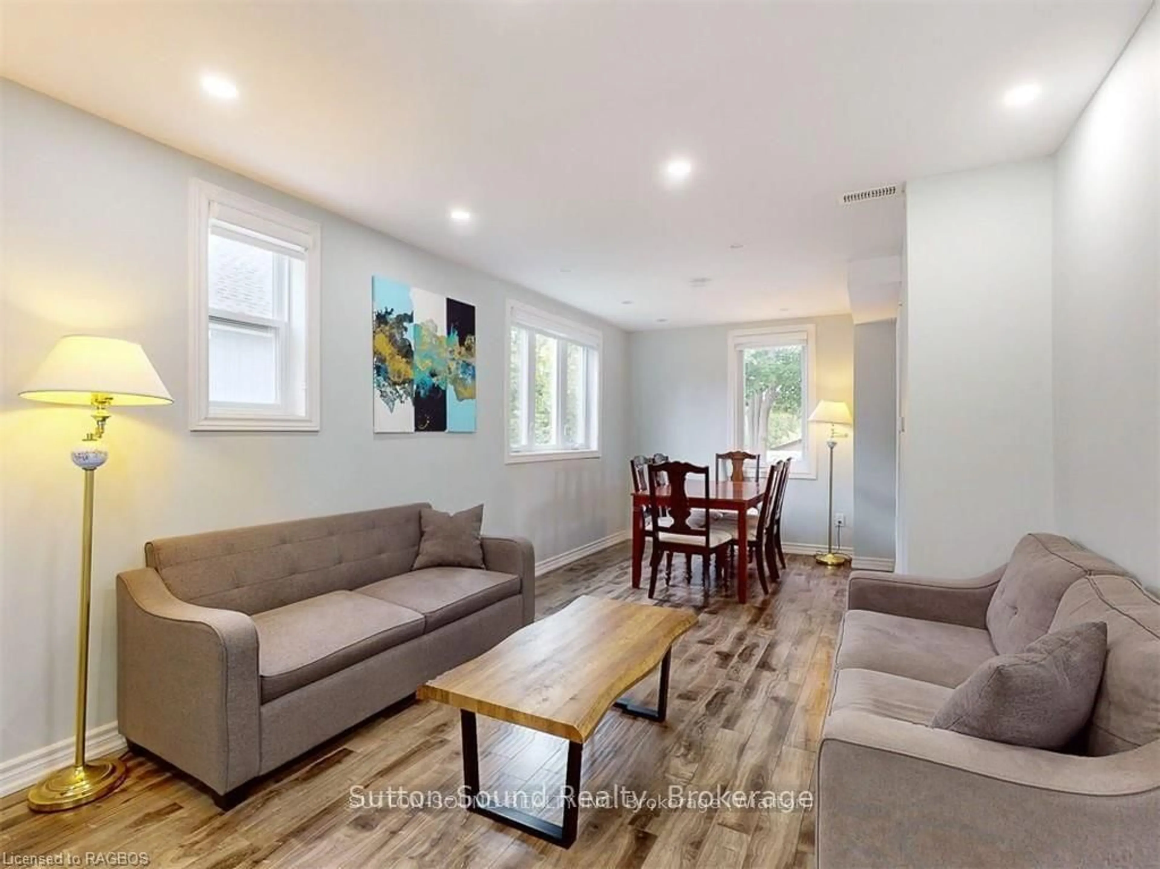 Living room with furniture, wood/laminate floor for 514 Frank St, South Bruce Peninsula Ontario N0H 2T0