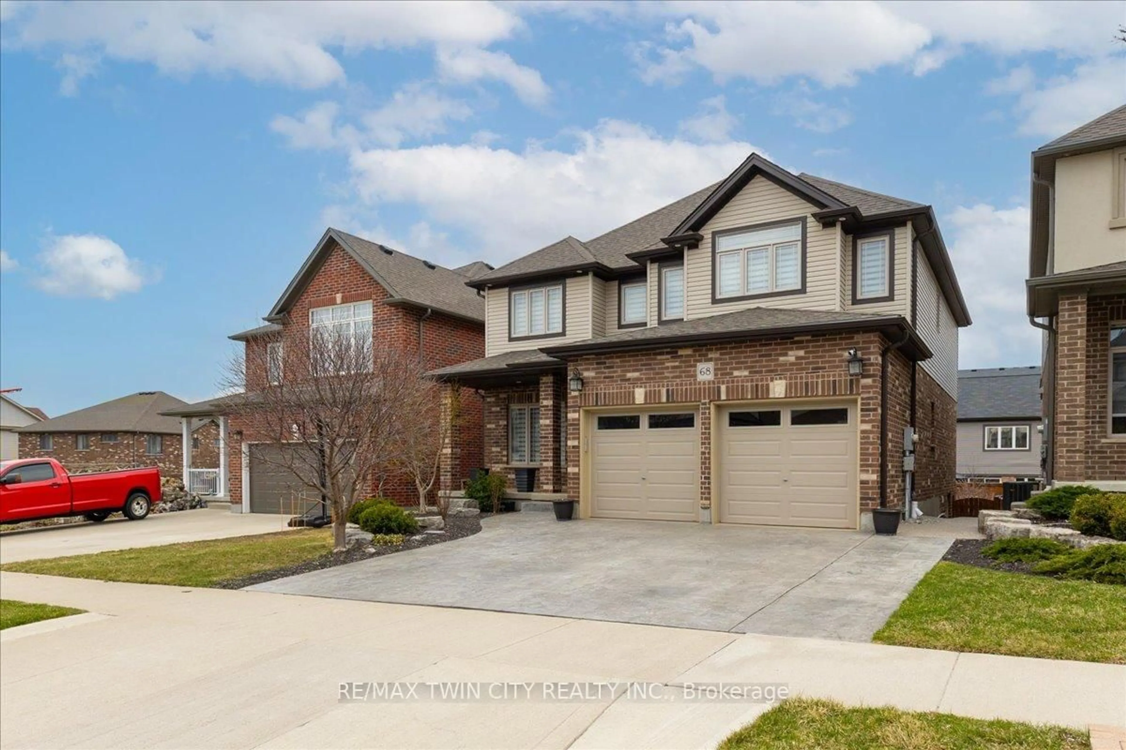 Home with brick exterior material, street for 68 Valleyscape Dr, Kitchener Ontario N2P 0G3