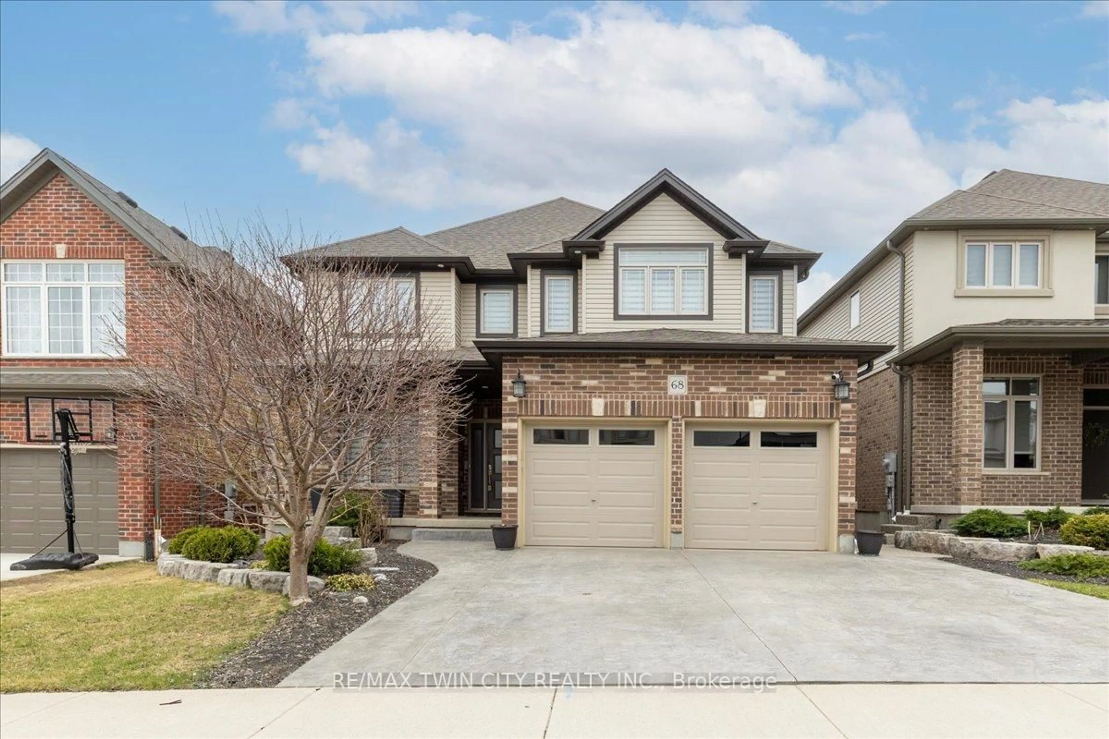 Home with brick exterior material, street for 68 Valleyscape Dr, Kitchener Ontario N2P 0G3