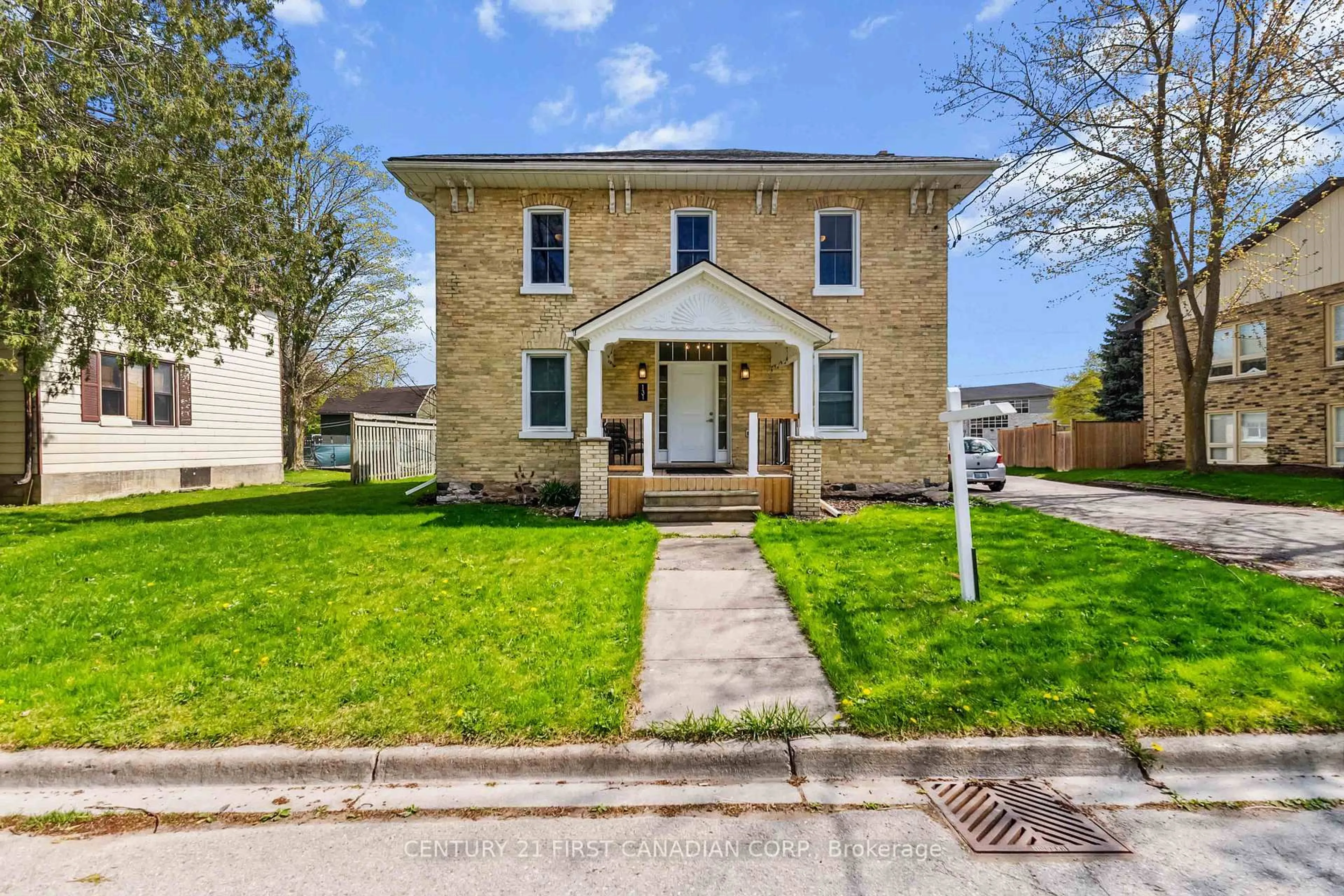 Home with brick exterior material, street for 131 Francis St, Lucan Biddulph Ontario N0M 2J0