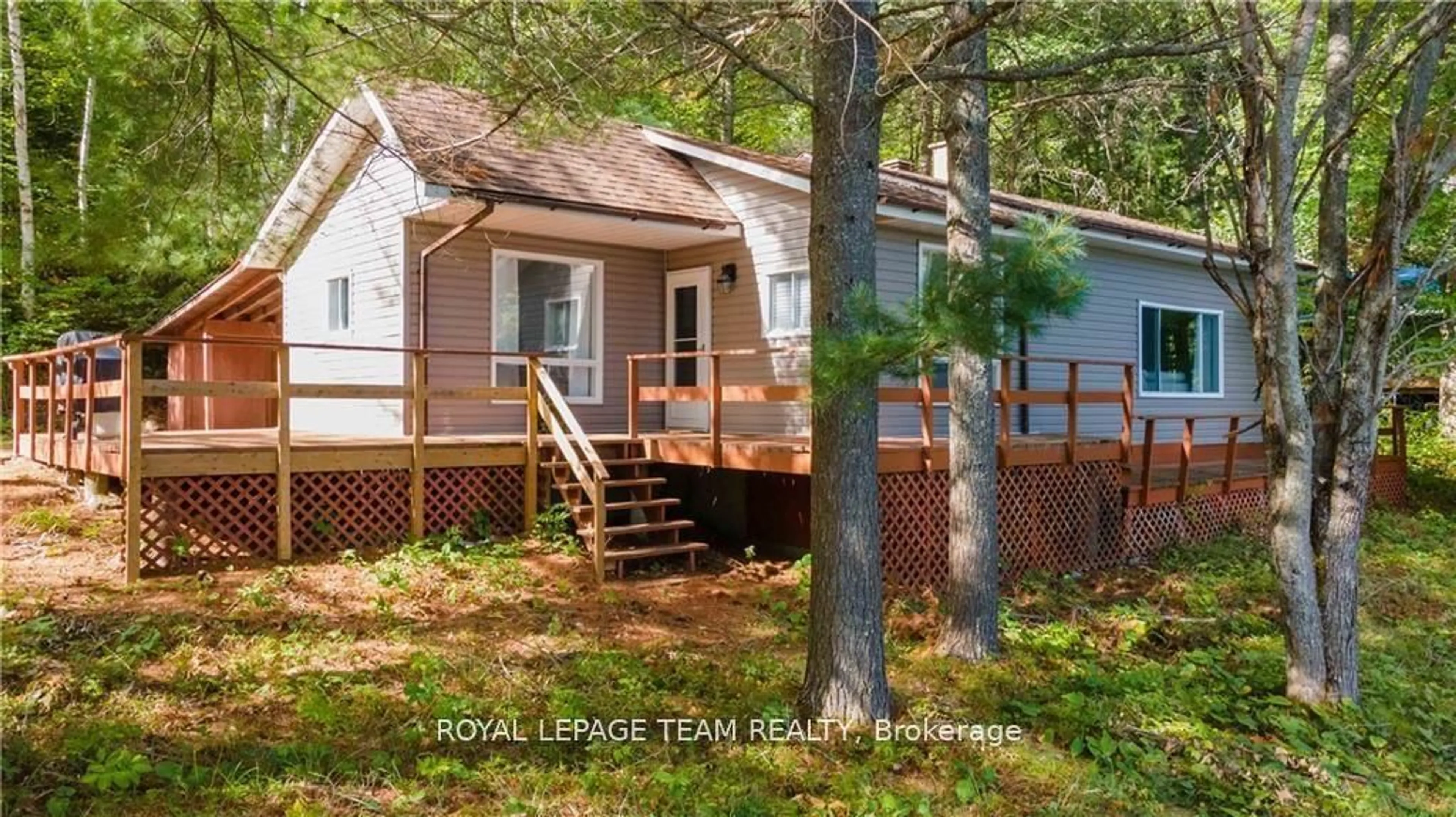 Home with vinyl exterior material, forest/trees view for 242 Chanonhouse Rd, Barry's Bay Ontario K0J 1B0