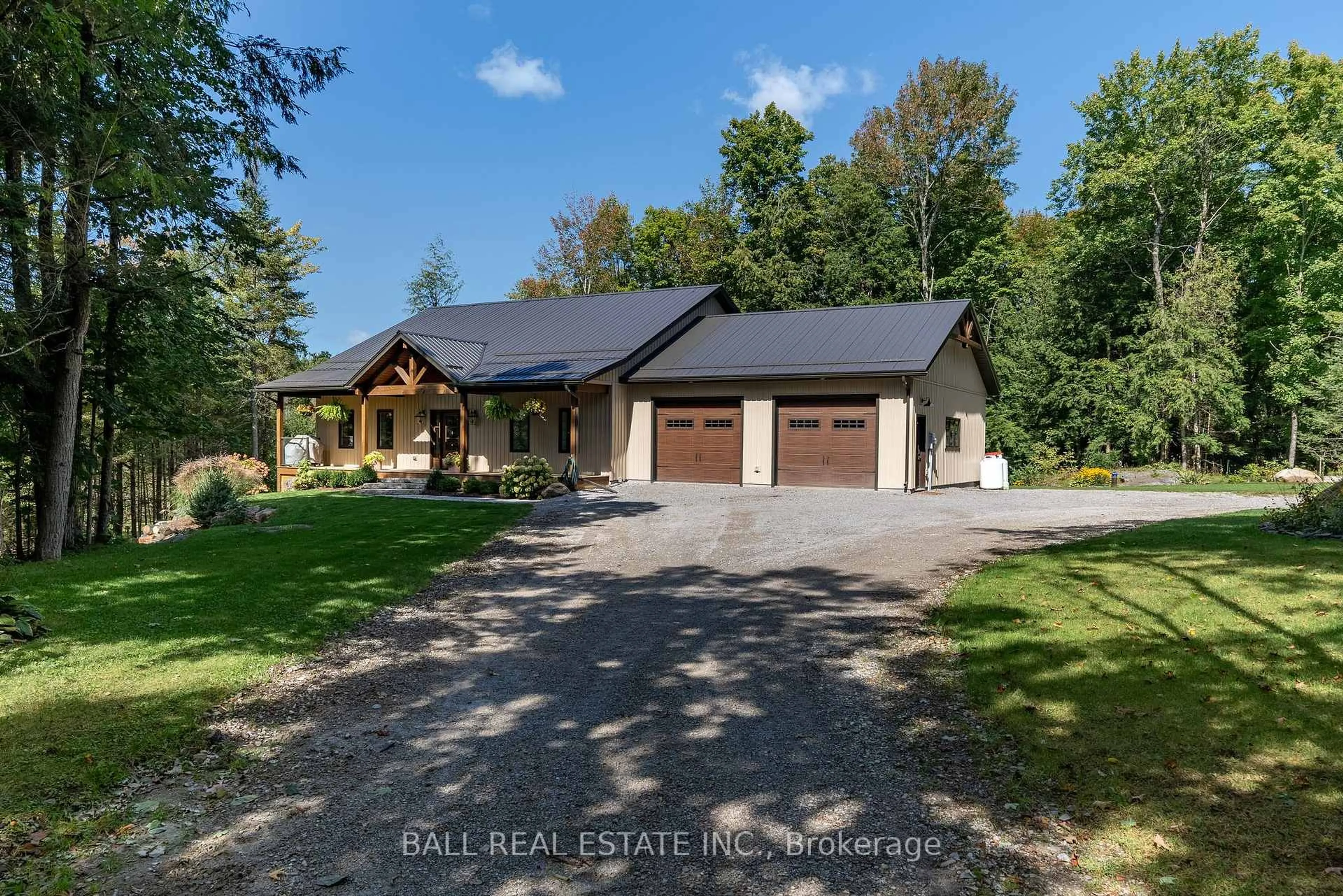 A pic from outside/outdoor area/front of a property/back of a property/a pic from drone, water/lake/river/ocean view for 201 Northern Ave, Trent Lakes Ontario K0M 1A0