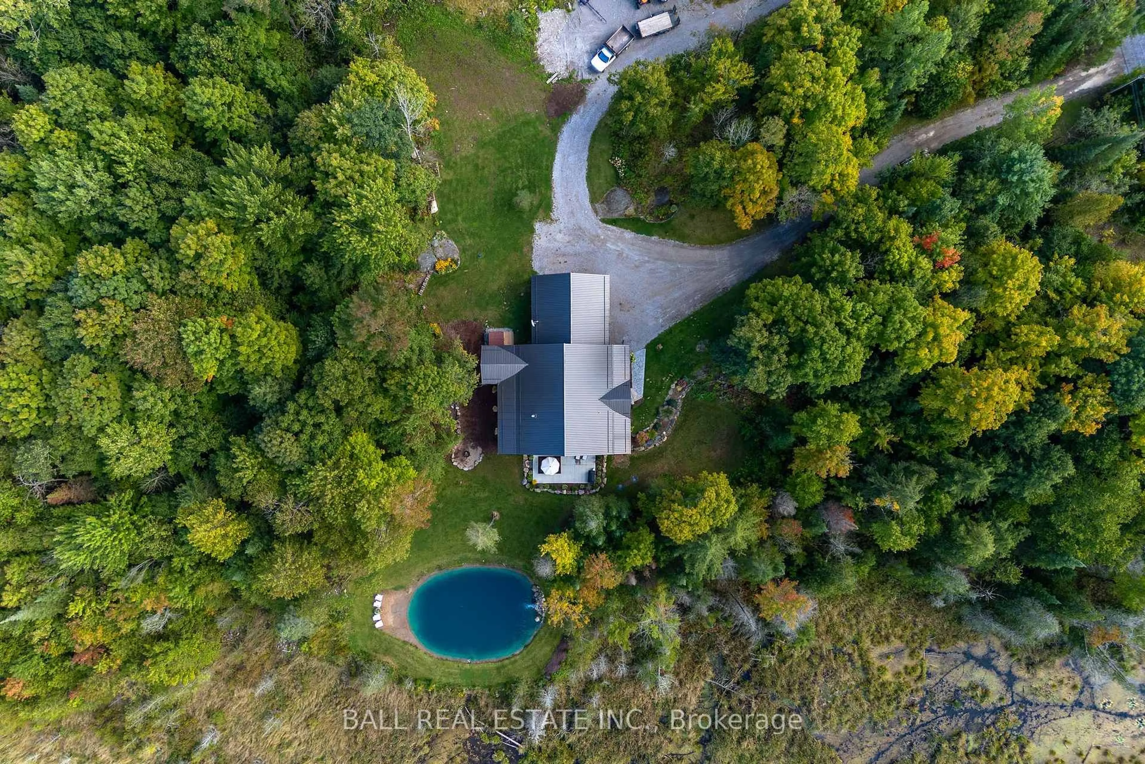 A pic from outside/outdoor area/front of a property/back of a property/a pic from drone, unknown for 201 Northern Ave, Trent Lakes Ontario K0M 1A0