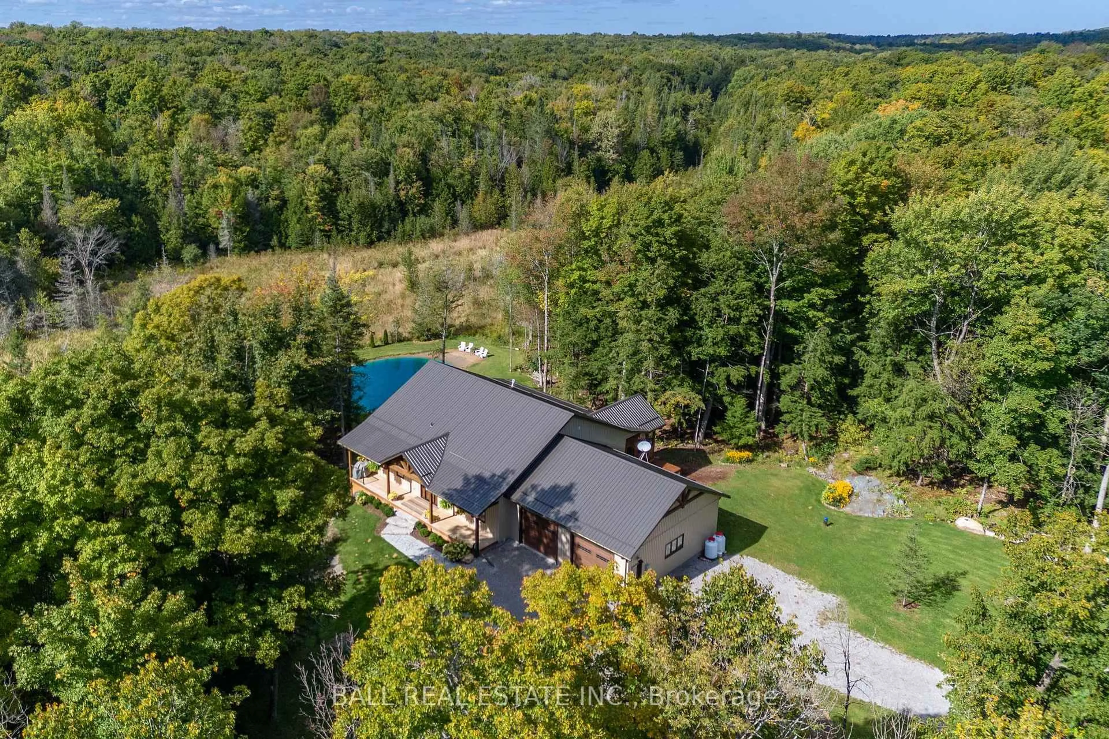 A pic from outside/outdoor area/front of a property/back of a property/a pic from drone, unknown for 201 Northern Ave, Trent Lakes Ontario K0M 1A0