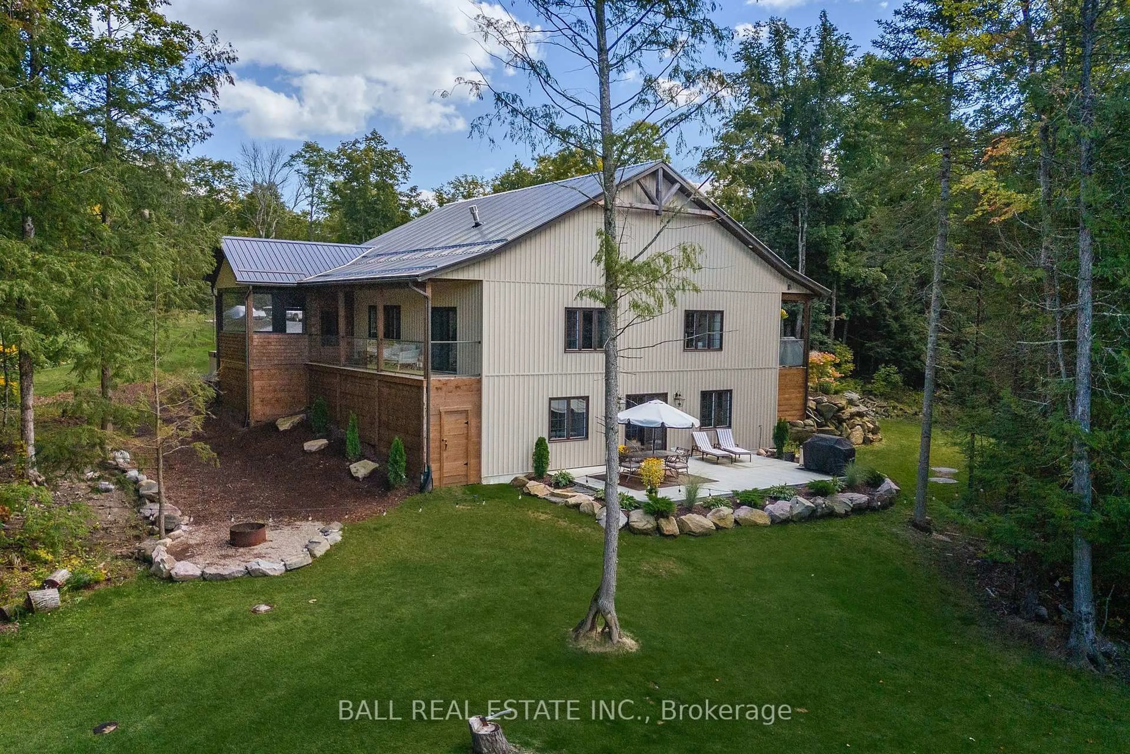 A pic from outside/outdoor area/front of a property/back of a property/a pic from drone, unknown for 201 Northern Ave, Trent Lakes Ontario K0M 1A0