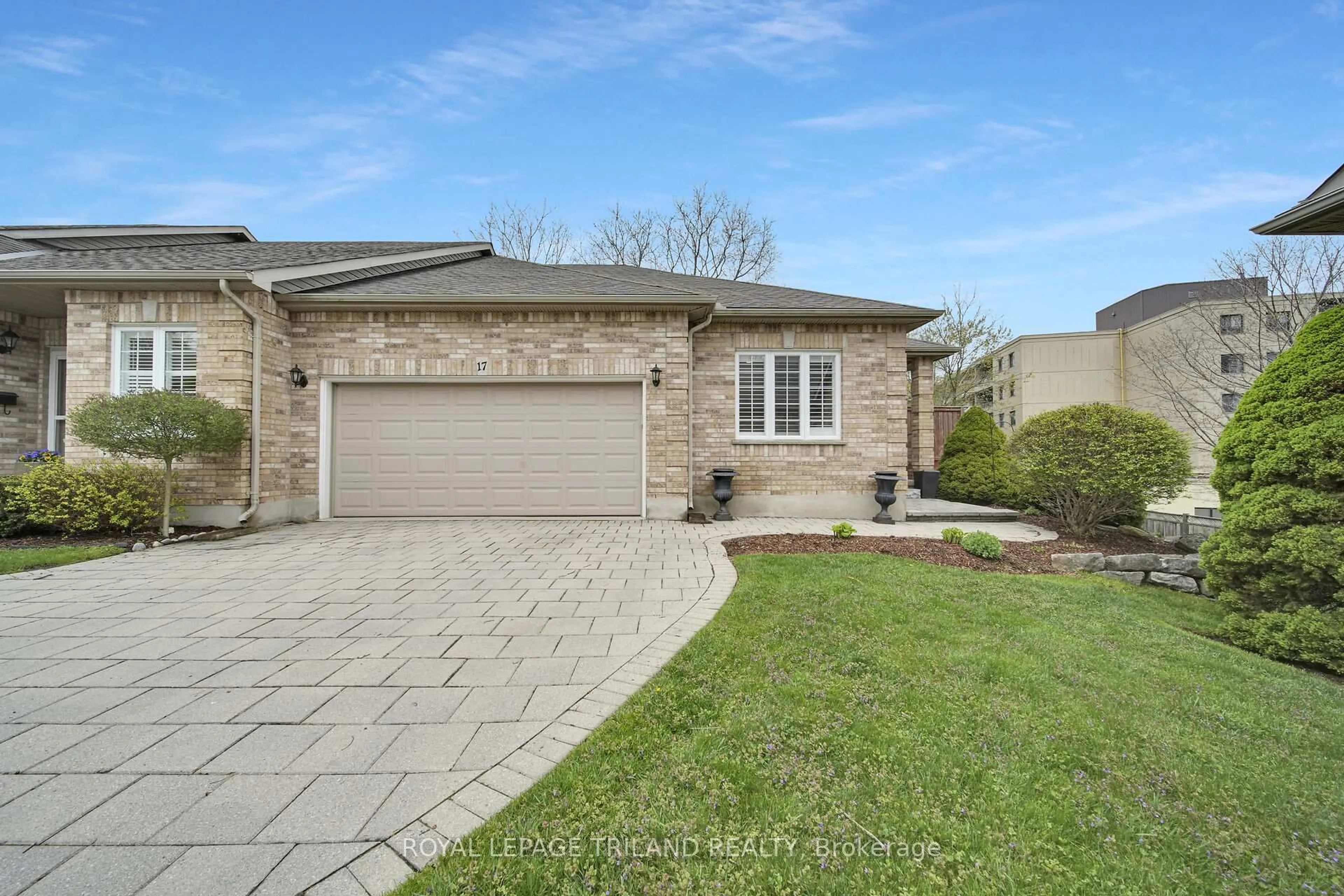 Home with brick exterior material, street for 1028 Commissioners Rd #17, London South Ontario N6K 1C3