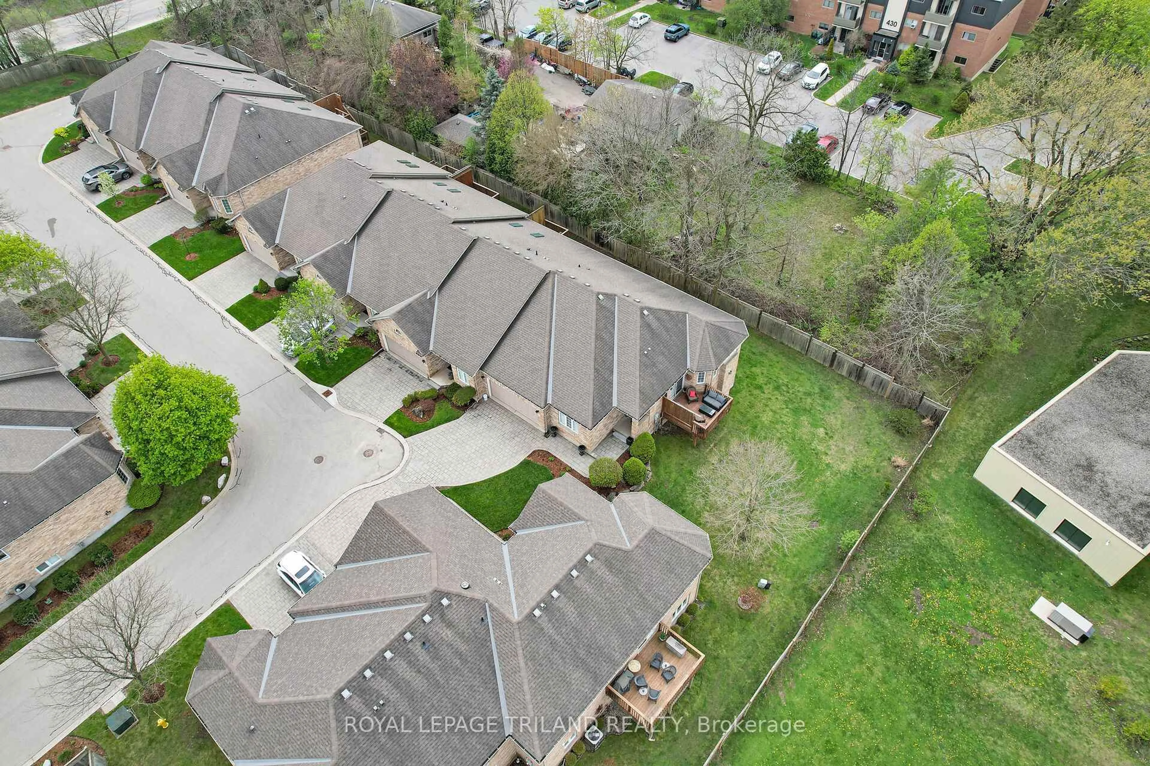 A pic from outside/outdoor area/front of a property/back of a property/a pic from drone, street for 1028 Commissioners Rd #17, London South Ontario N6K 1C3