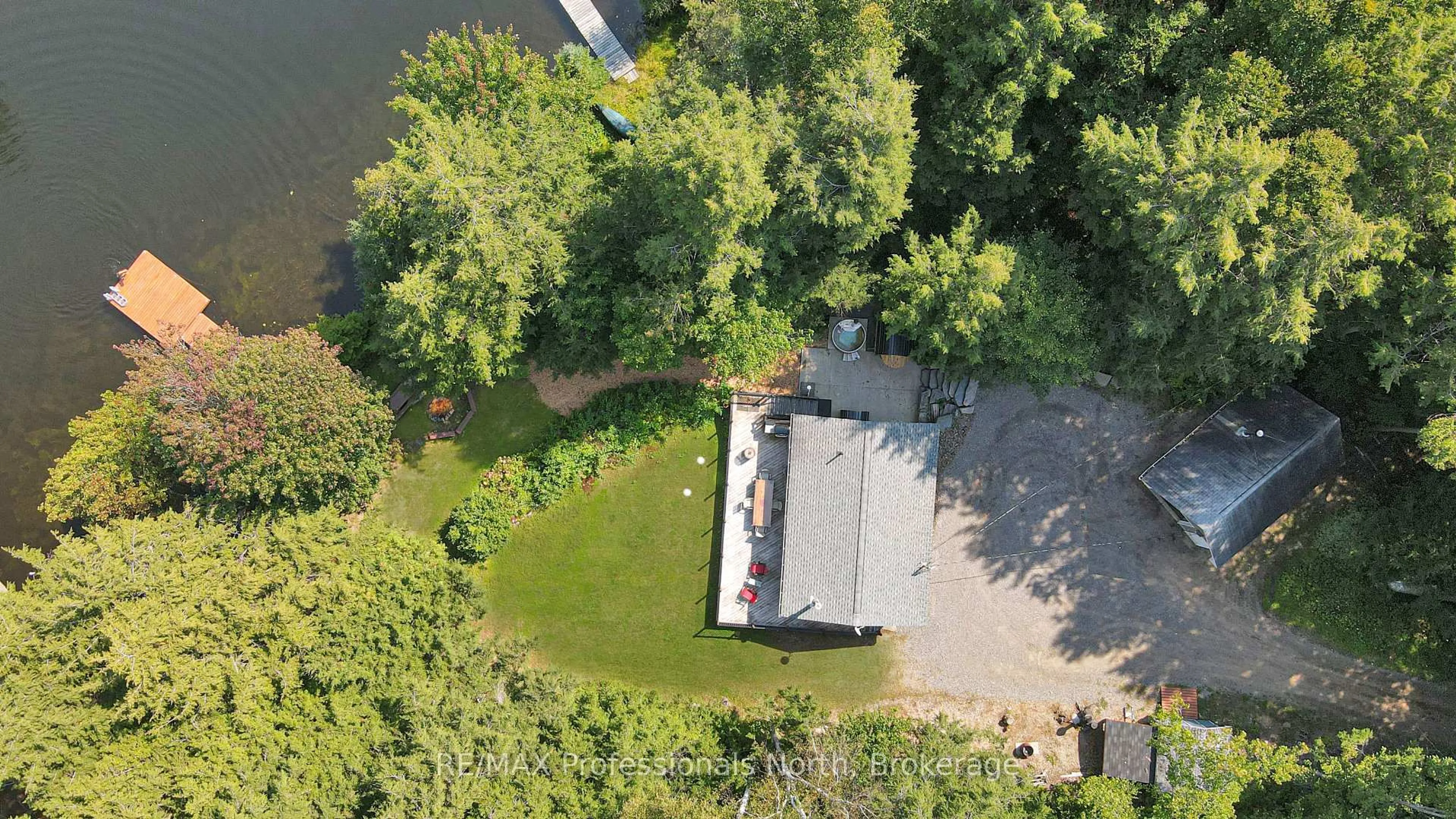 A pic from outside/outdoor area/front of a property/back of a property/a pic from drone, water/lake/river/ocean view for 1192 Charlie George Lake Dr, Dysart et al Ontario K0L 1X0
