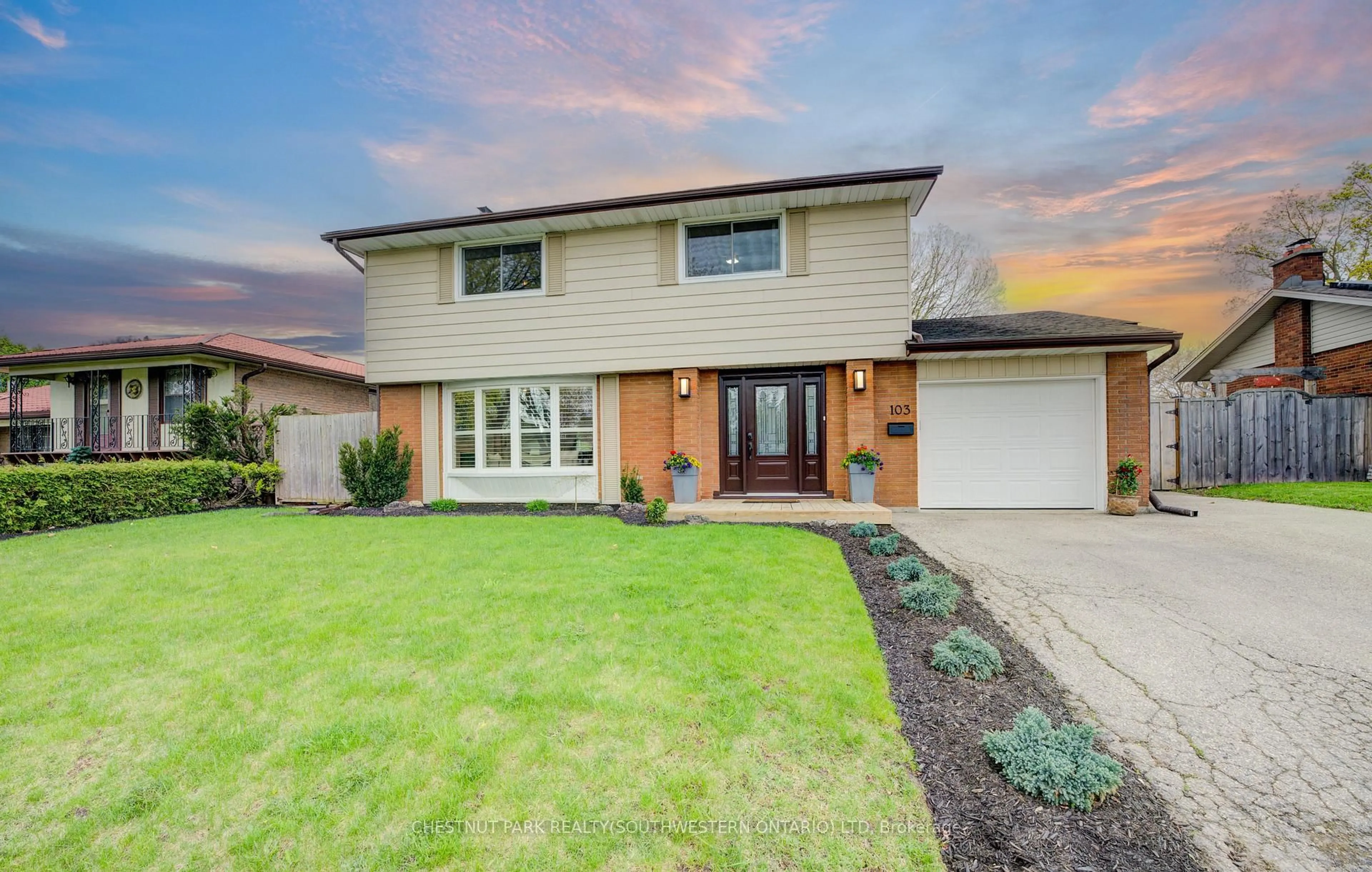 Home with brick exterior material, street for 103 Montcalm Dr, Kitchener Ontario N2B 2R4