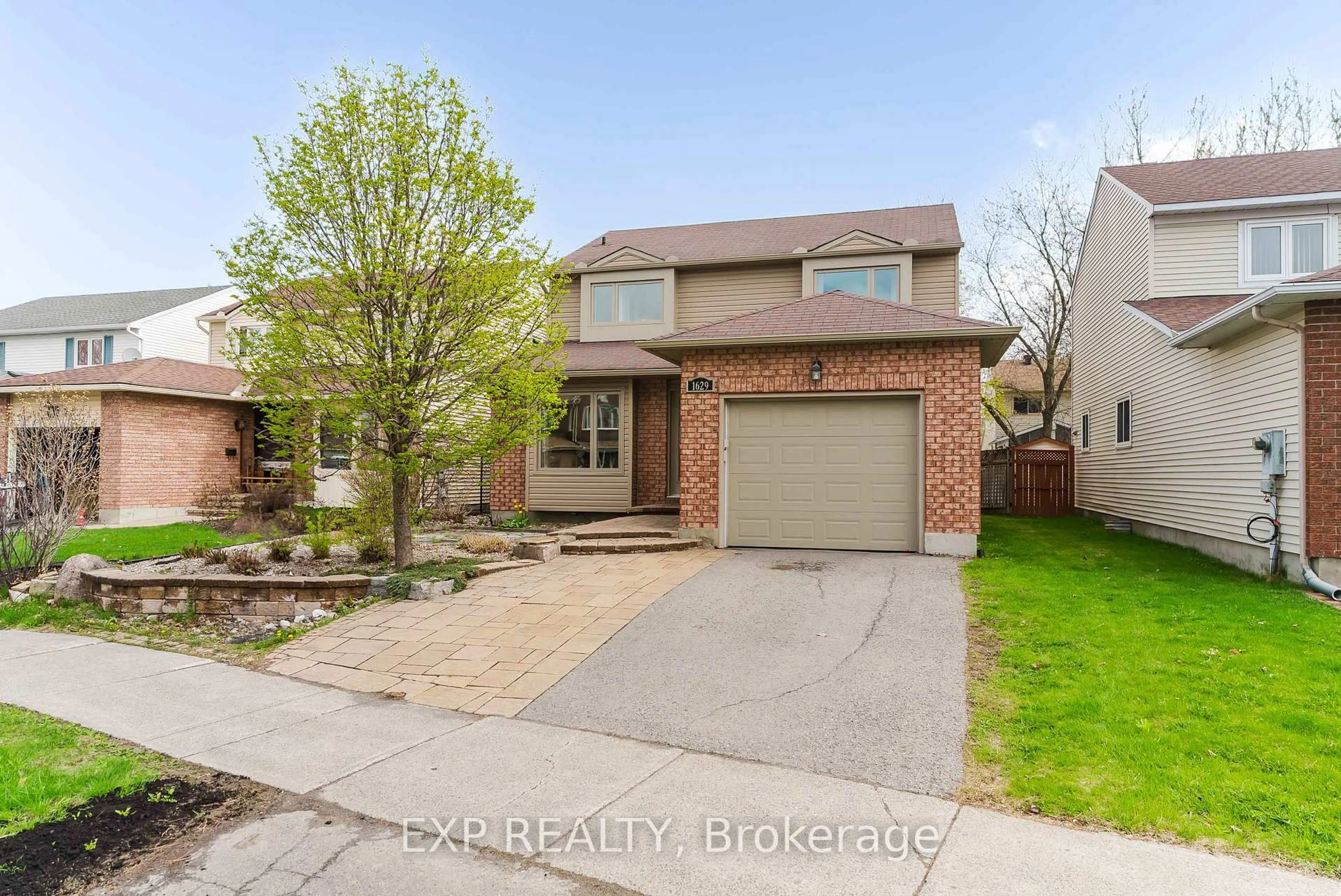 Home with brick exterior material, street for 1629 Champneuf Dr, Ottawa Ontario K1C 6C1