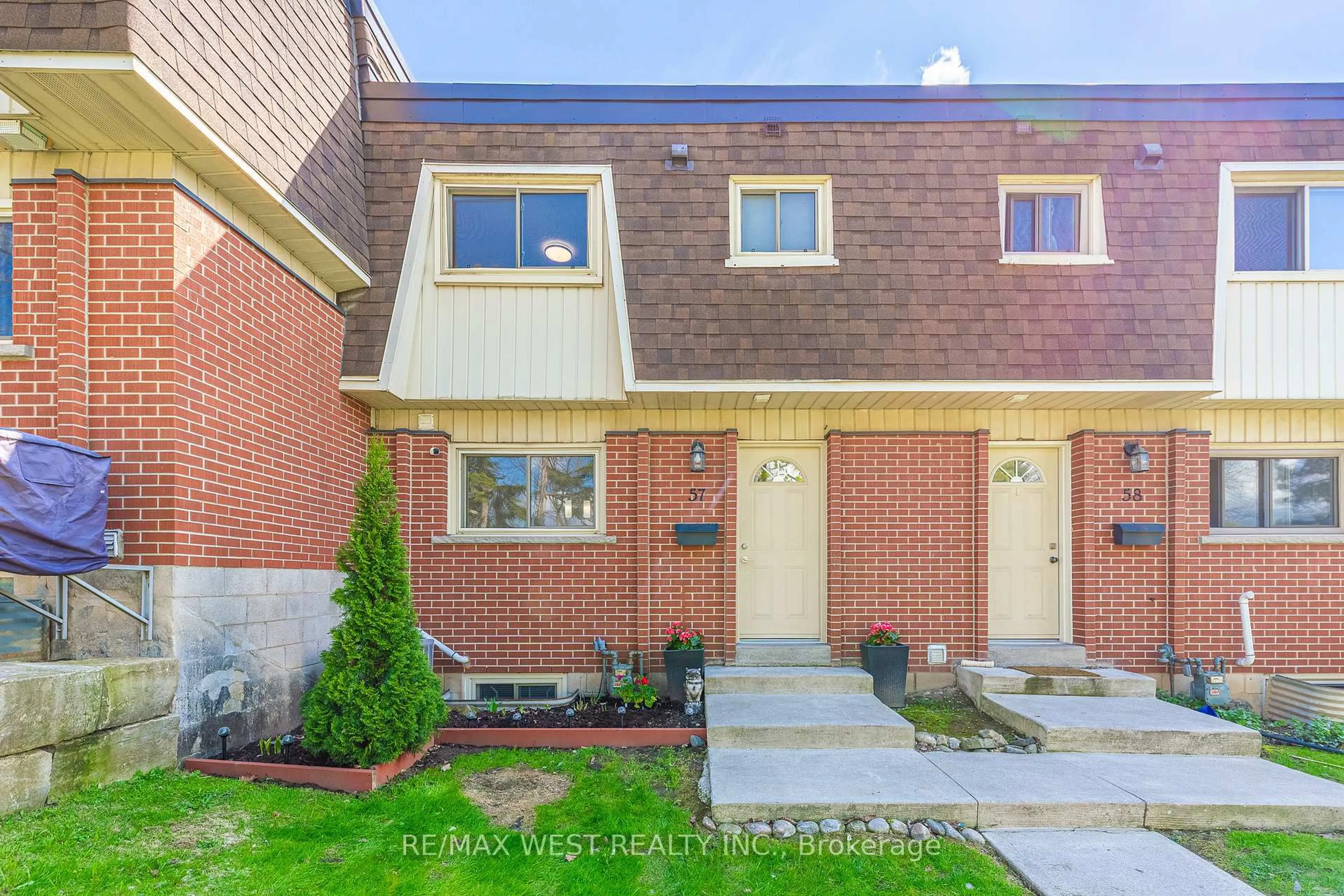 Home with brick exterior material, street for 125 Bonaventure Dr #57, Hamilton Ontario L9C 5Y9