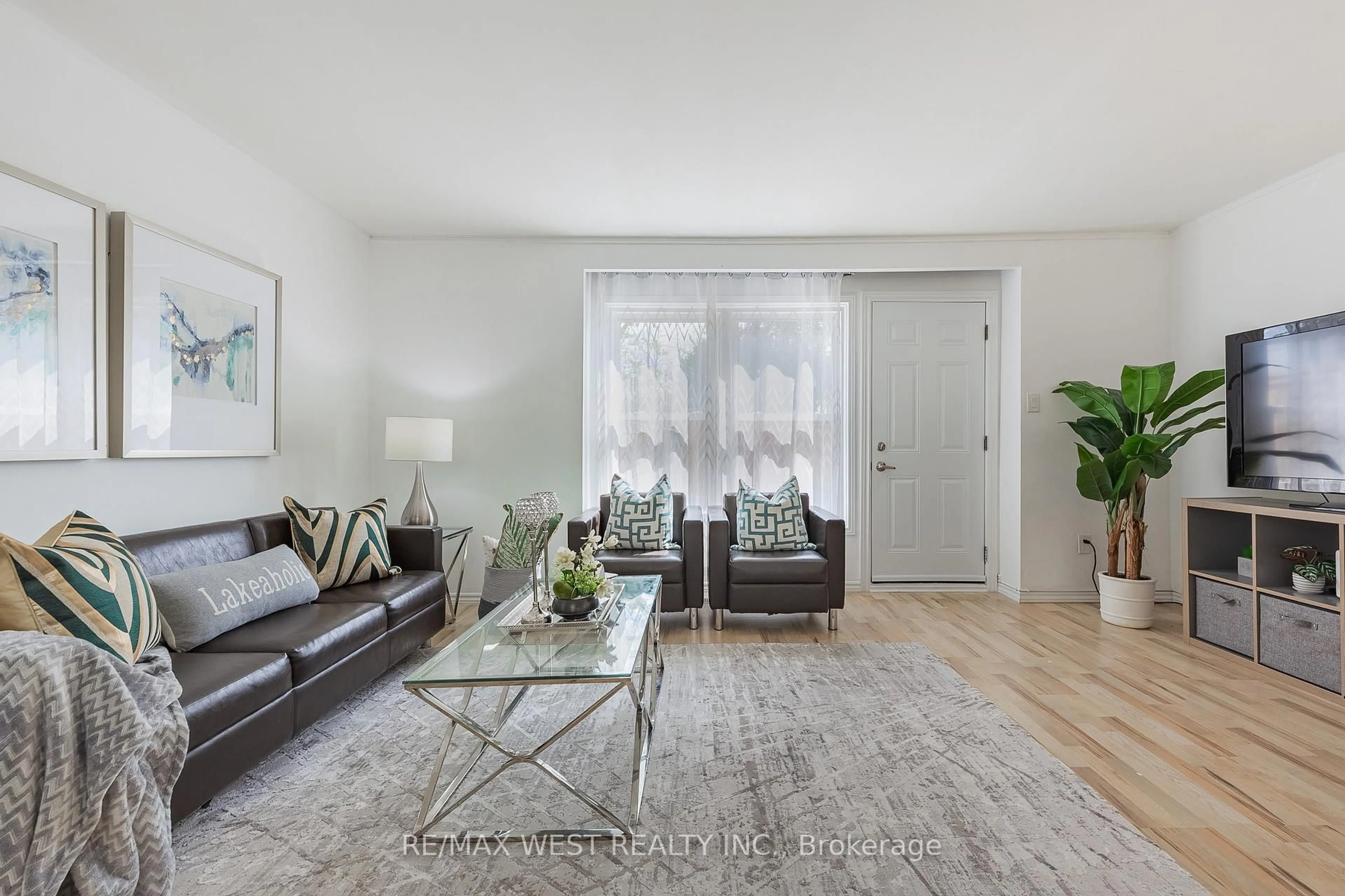 Living room with furniture, unknown for 125 Bonaventure Dr #57, Hamilton Ontario L9C 5Y9