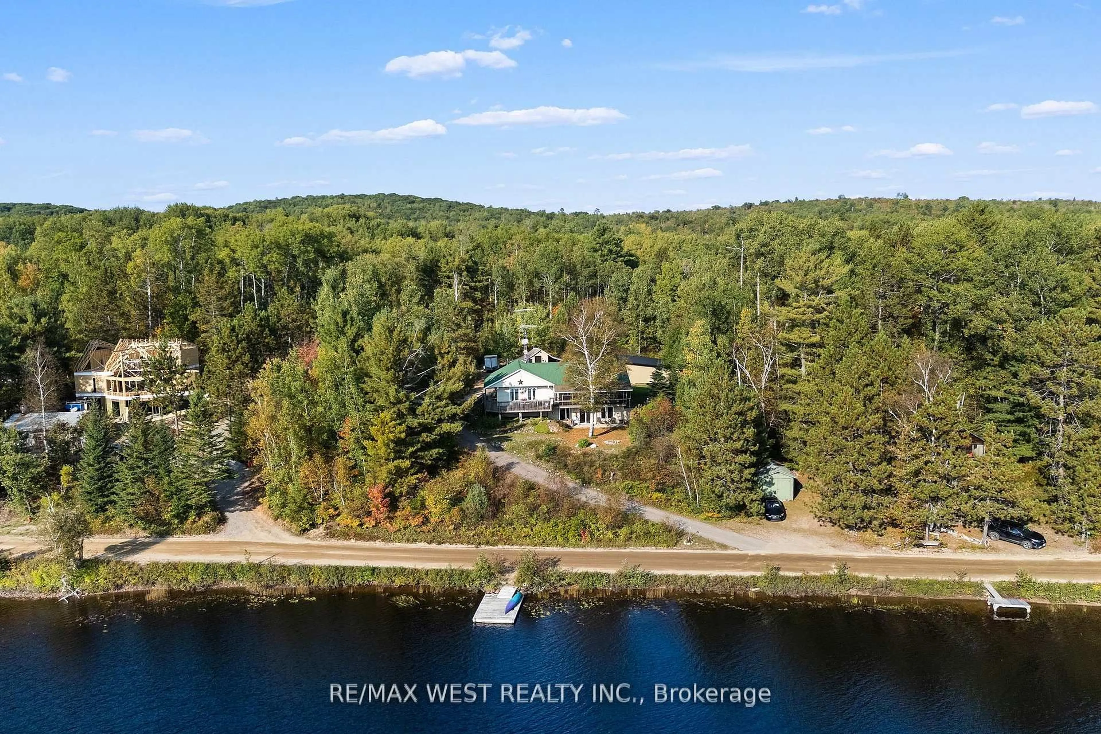 A pic from outside/outdoor area/front of a property/back of a property/a pic from drone, water/lake/river/ocean view for 558 Mccauley Lake Rd, South Algonquin Ontario K0J 2C0