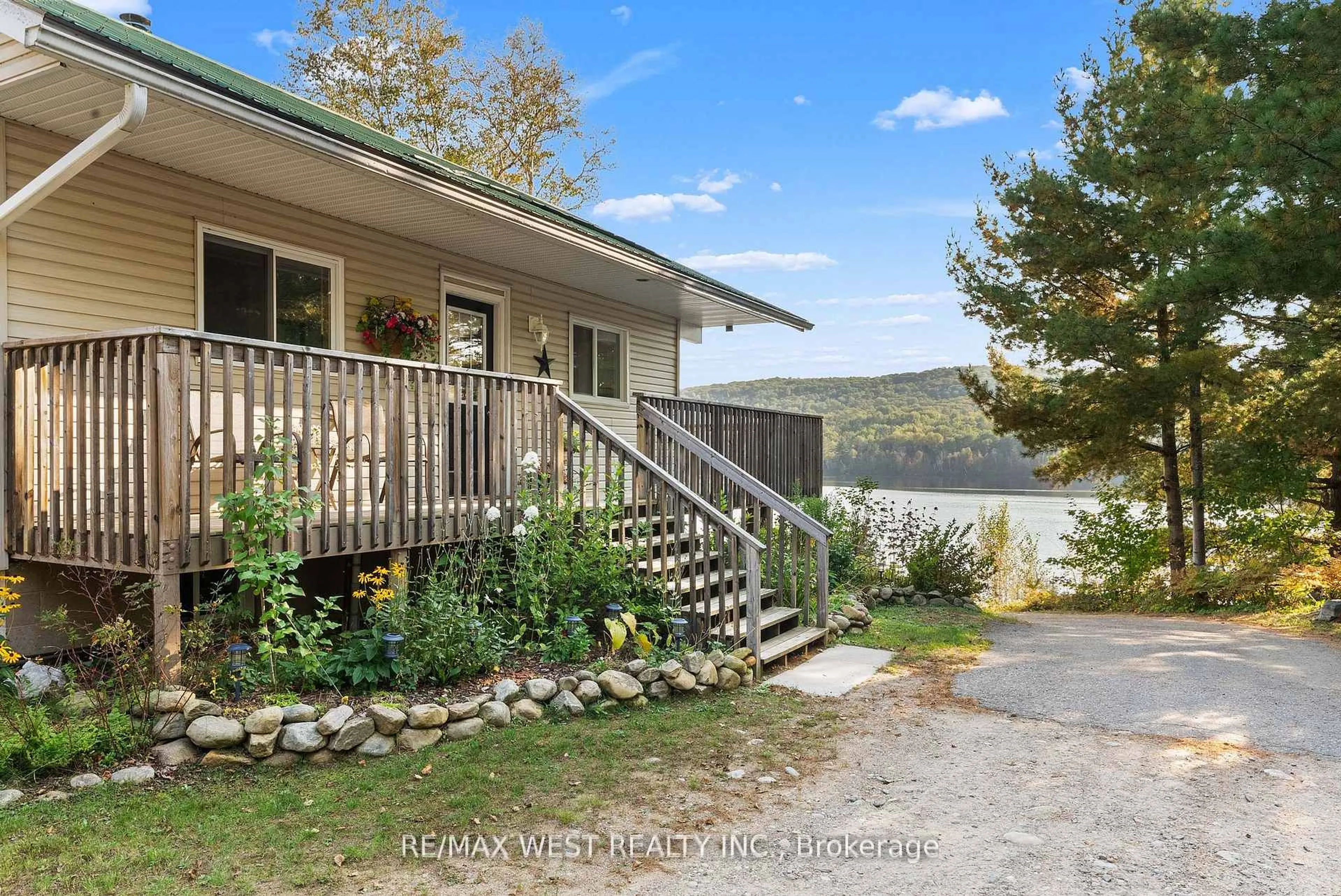 A pic from outside/outdoor area/front of a property/back of a property/a pic from drone, water/lake/river/ocean view for 558 Mccauley Lake Rd, South Algonquin Ontario K0J 2C0