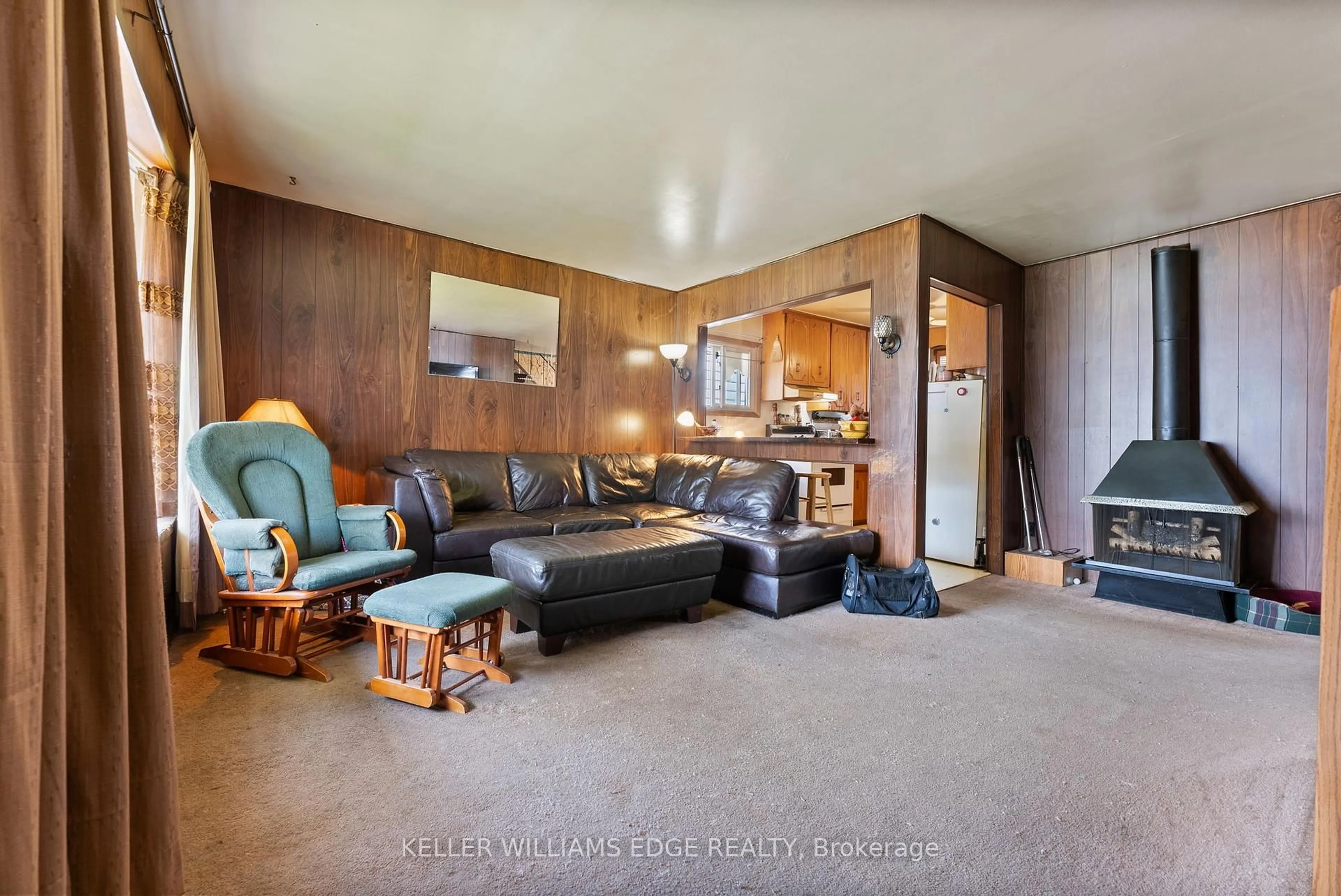 Living room with furniture, unknown for 296 Ivon Ave, Hamilton Ontario L8H 5T2