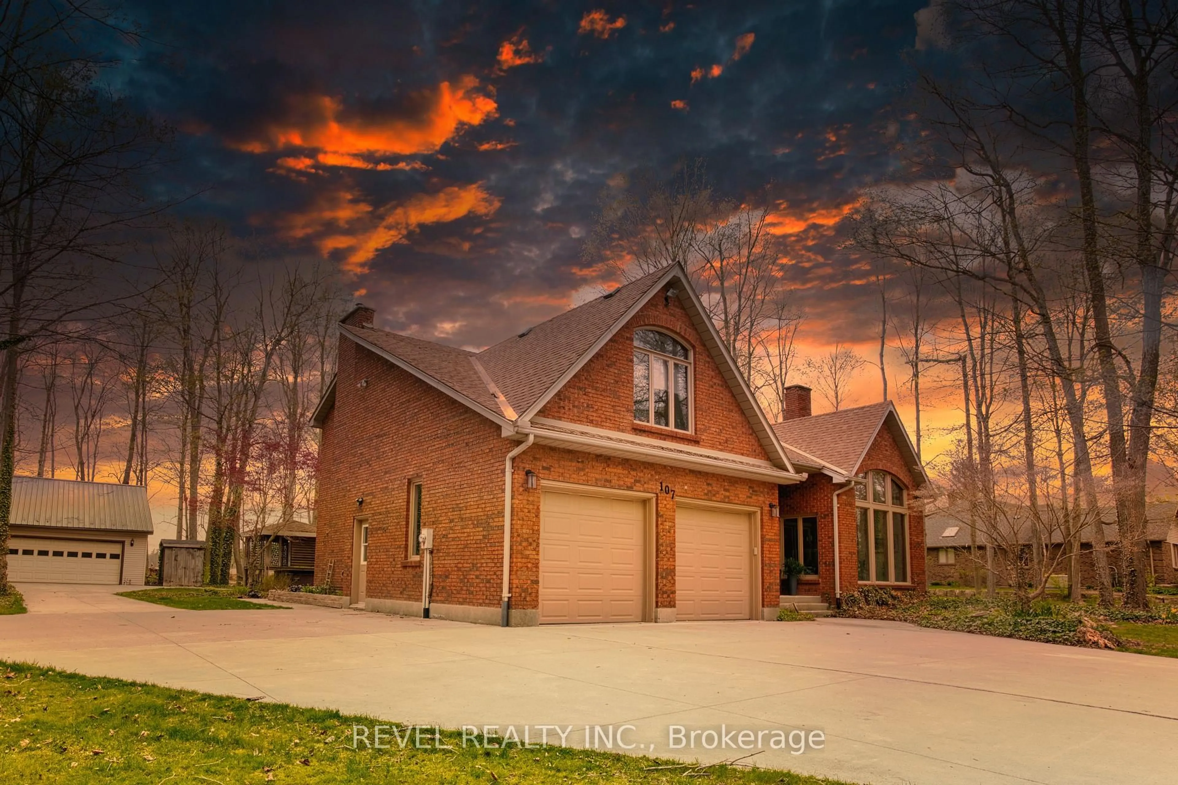 Home with brick exterior material, street for 107 Lewis Dr, Middlesex Centre Ontario N0M 2A0