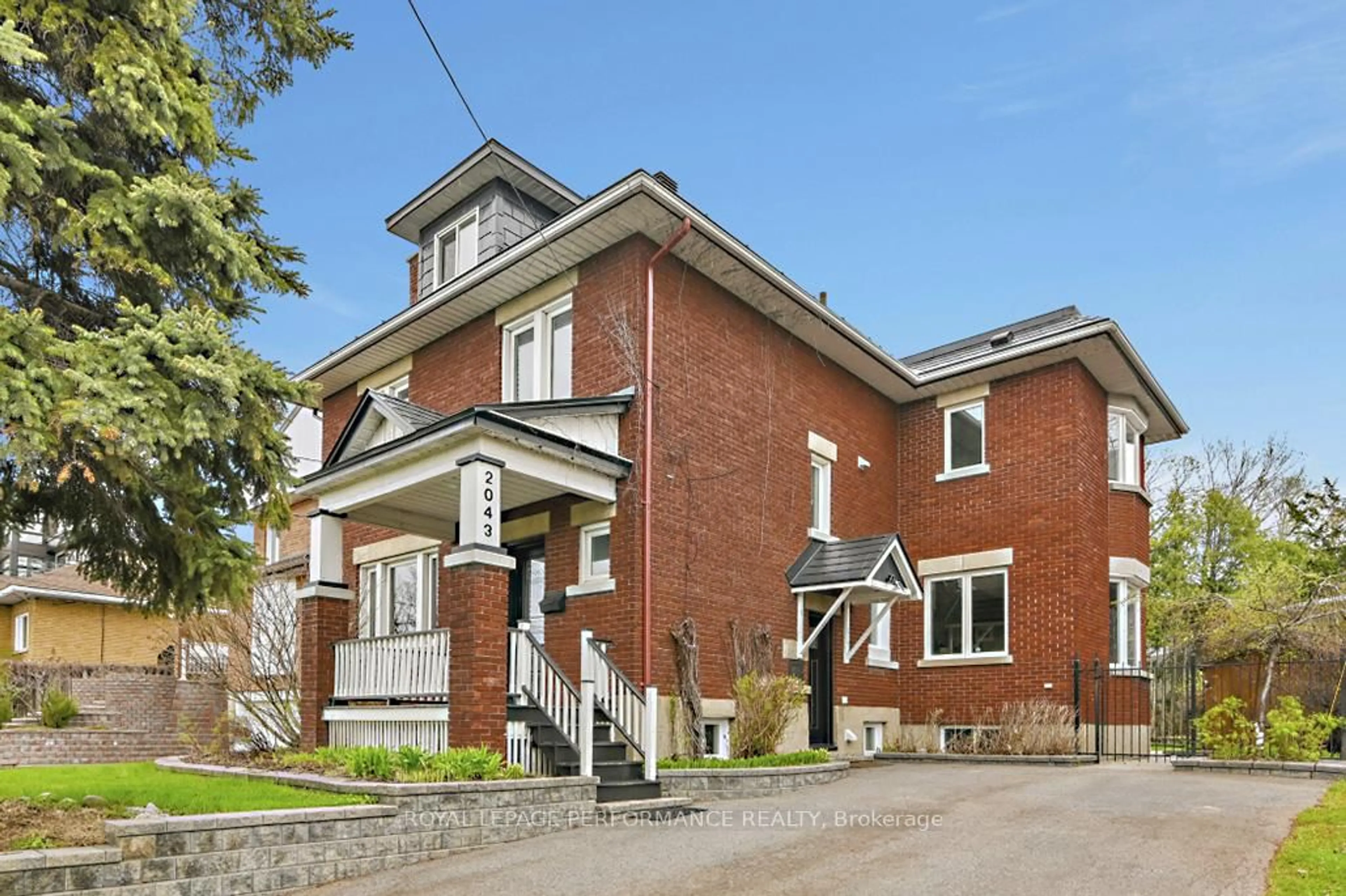Home with brick exterior material, building for 2043 Riverside Dr, Ottawa Ontario K1H 7X1