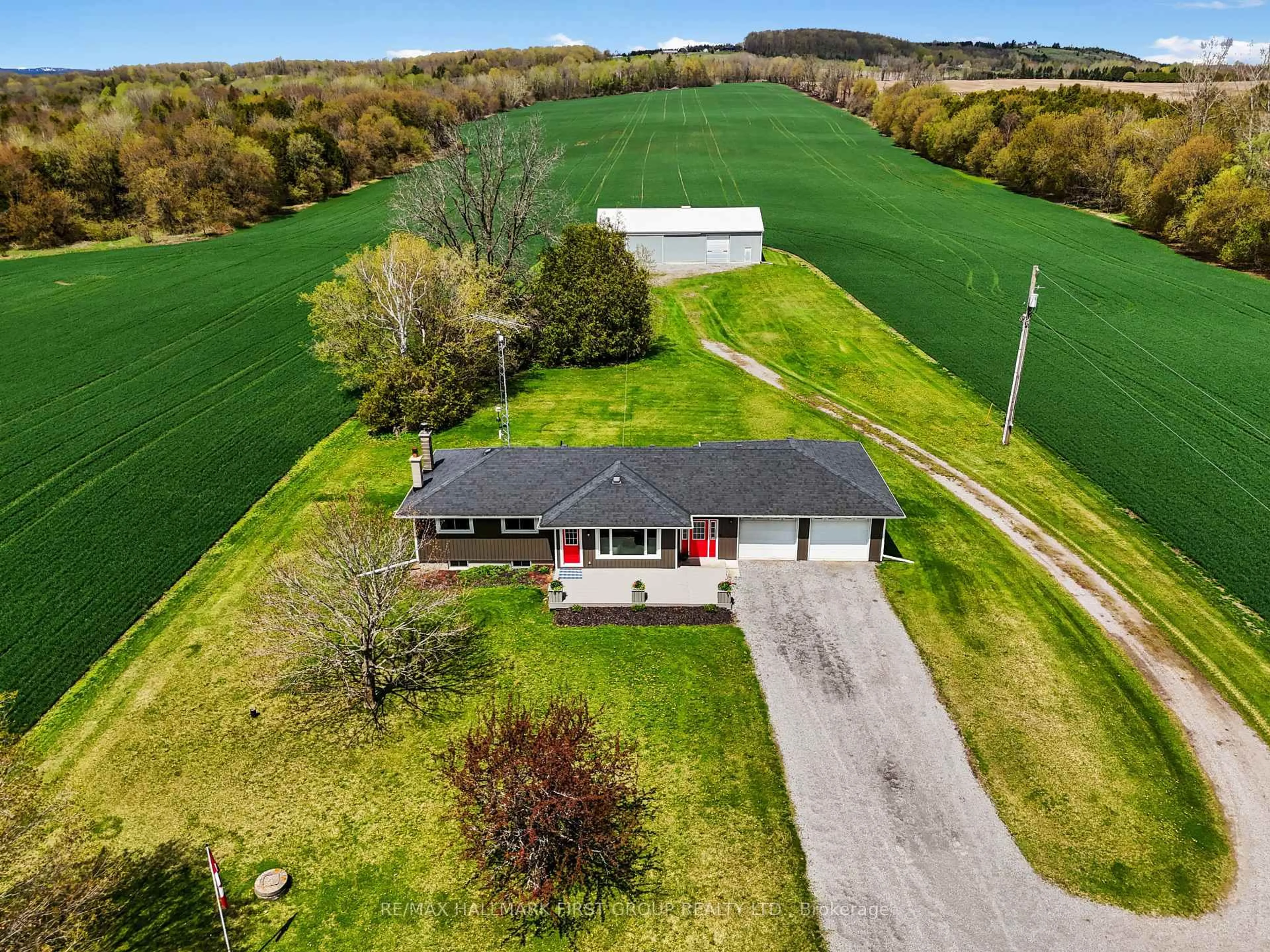 A pic from outside/outdoor area/front of a property/back of a property/a pic from drone, water/lake/river/ocean view for 2350 7th Line, Port Hope Ontario L1A 3V5