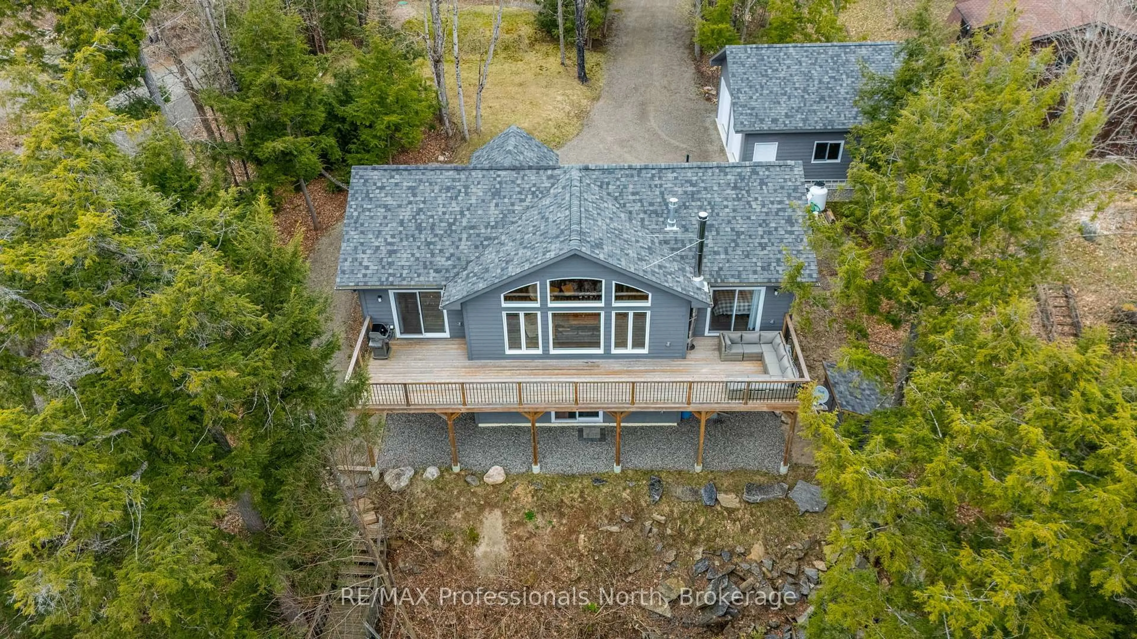 A pic from outside/outdoor area/front of a property/back of a property/a pic from drone, unknown for 5997 Kennisis Lake Rd, Dysart et al Ontario K0M 1S0