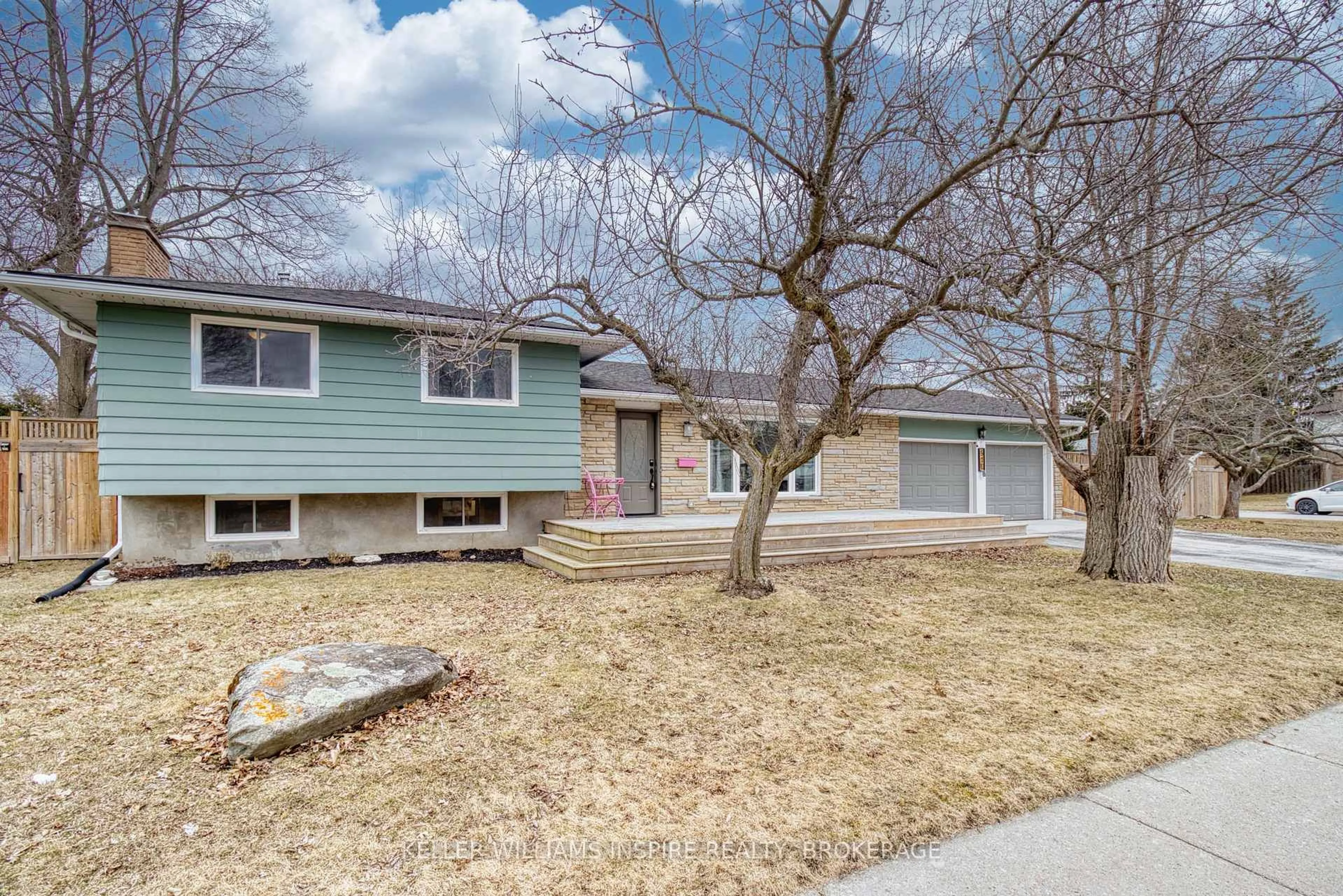 Home with vinyl exterior material, street for 910 Auden Park Dr, Kingston Ontario K7M 5S1