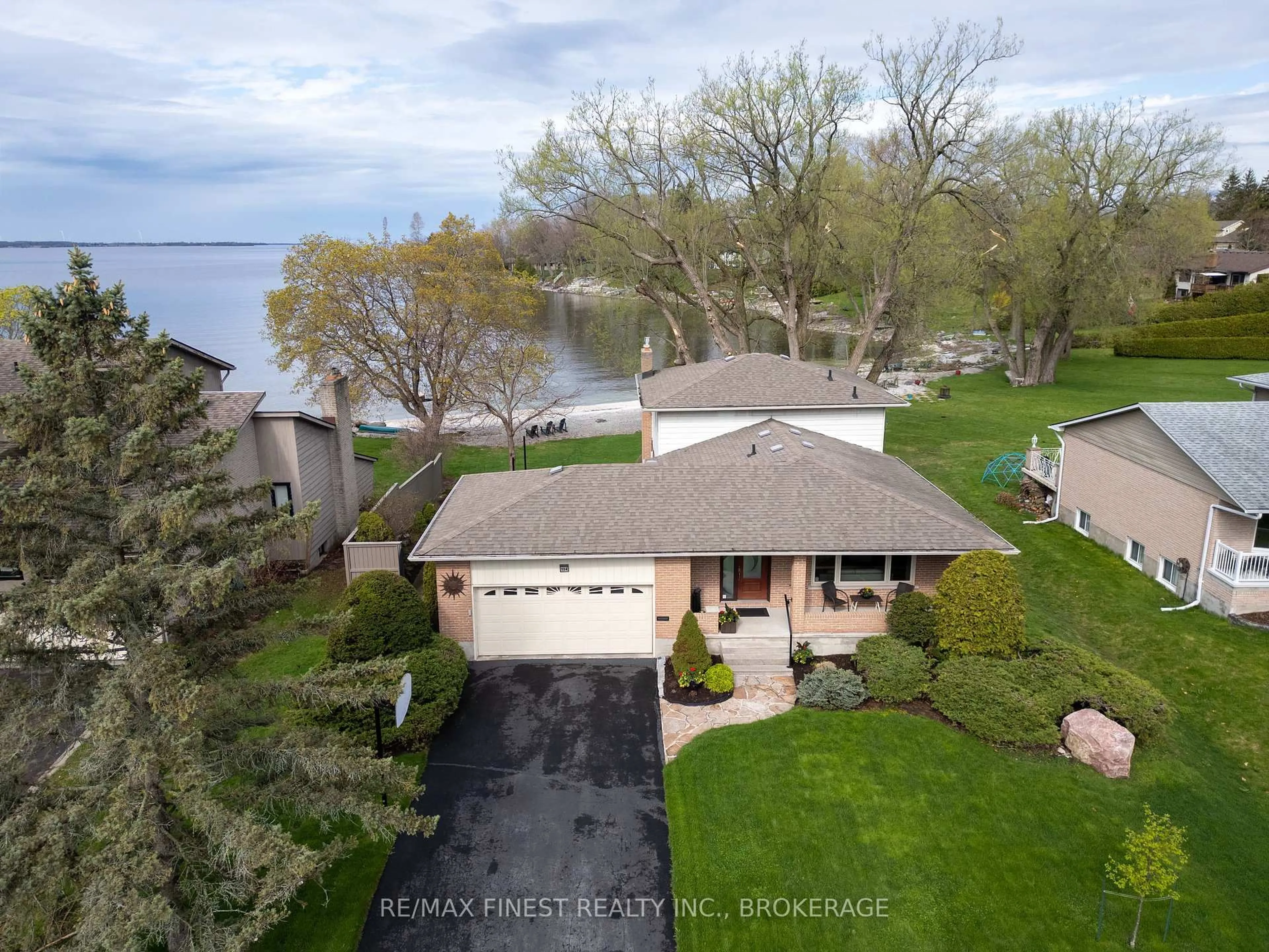 A pic from outside/outdoor area/front of a property/back of a property/a pic from drone, water/lake/river/ocean view for 154 Lakeshore Blvd, Kingston Ontario K7M 6R5