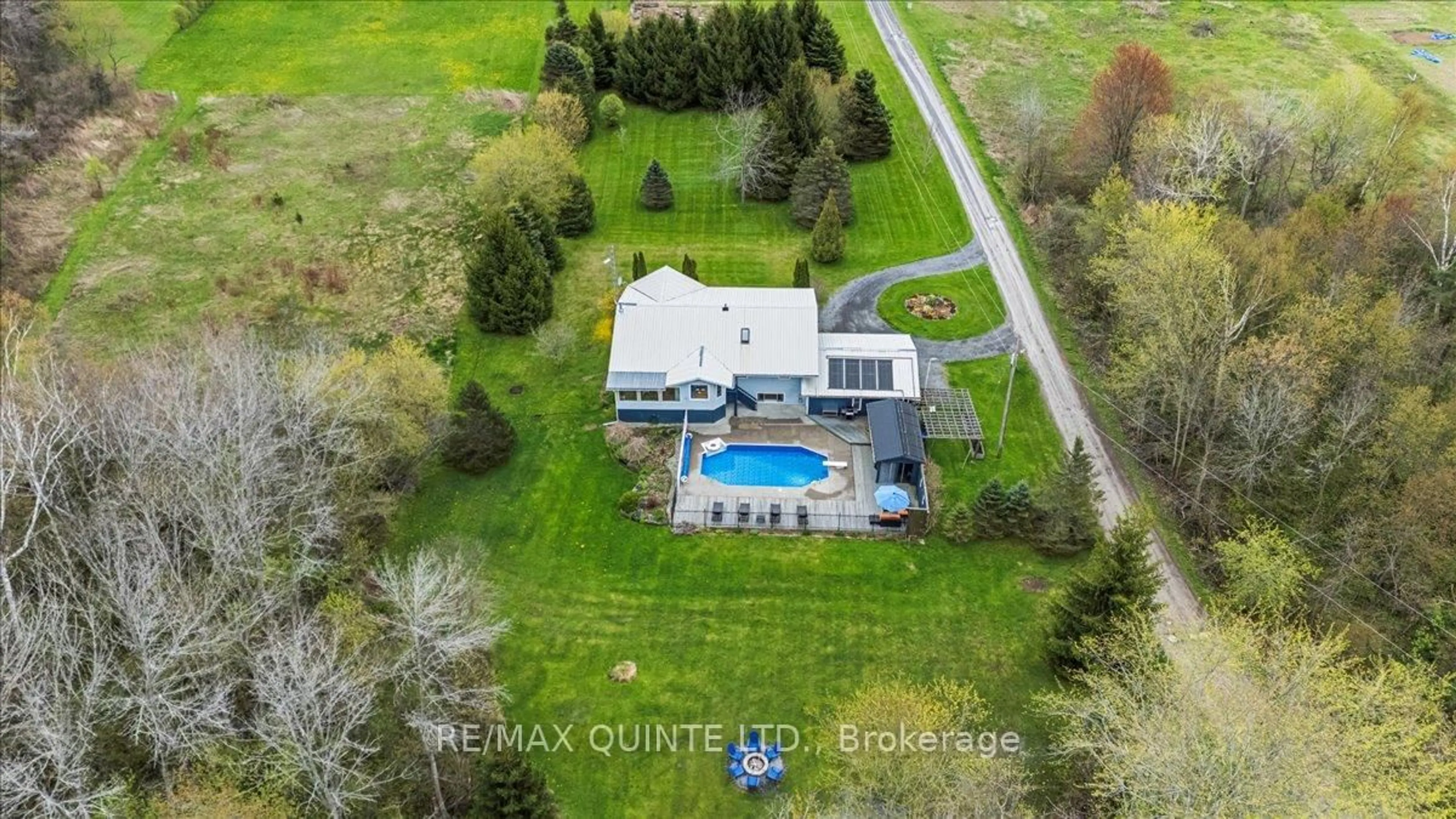 A pic from outside/outdoor area/front of a property/back of a property/a pic from drone, water/lake/river/ocean view for 36 Williams Lane, Prince Edward County Ontario K0K 2T0
