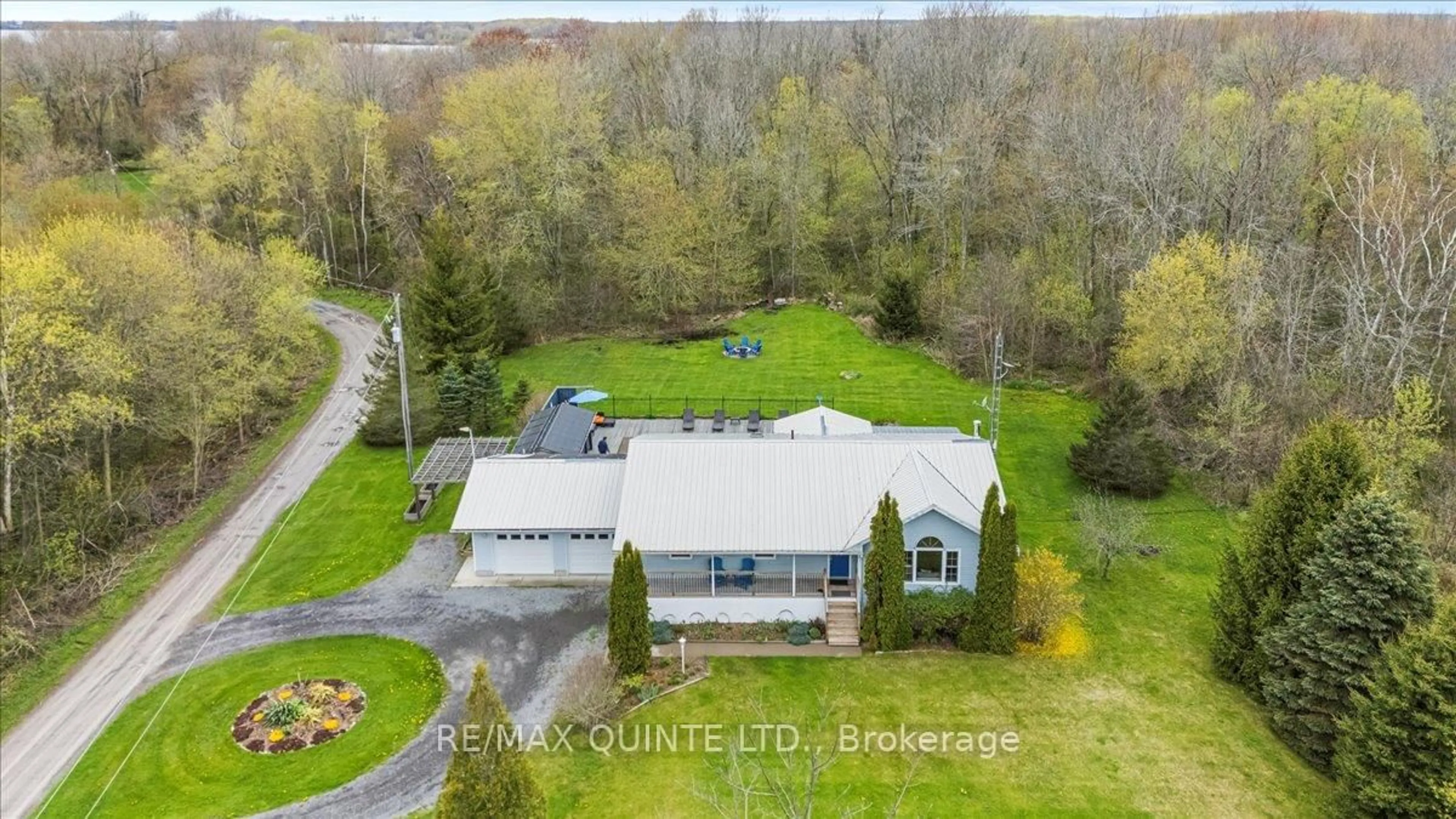 A pic from outside/outdoor area/front of a property/back of a property/a pic from drone, water/lake/river/ocean view for 36 Williams Lane, Prince Edward County Ontario K0K 2T0