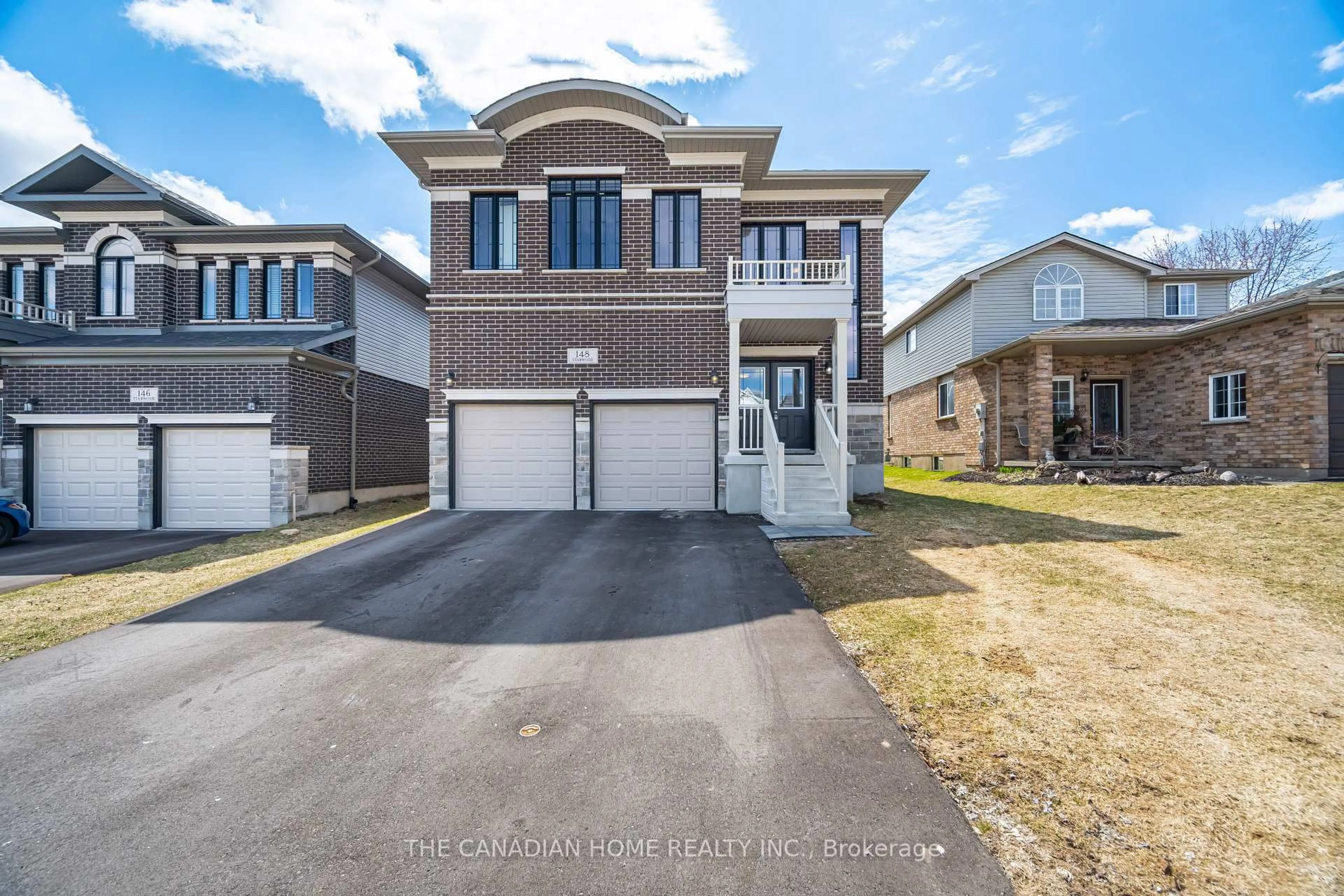 Home with brick exterior material, street for 148 STARWOOD Dr, Guelph Ontario N1E 7G7