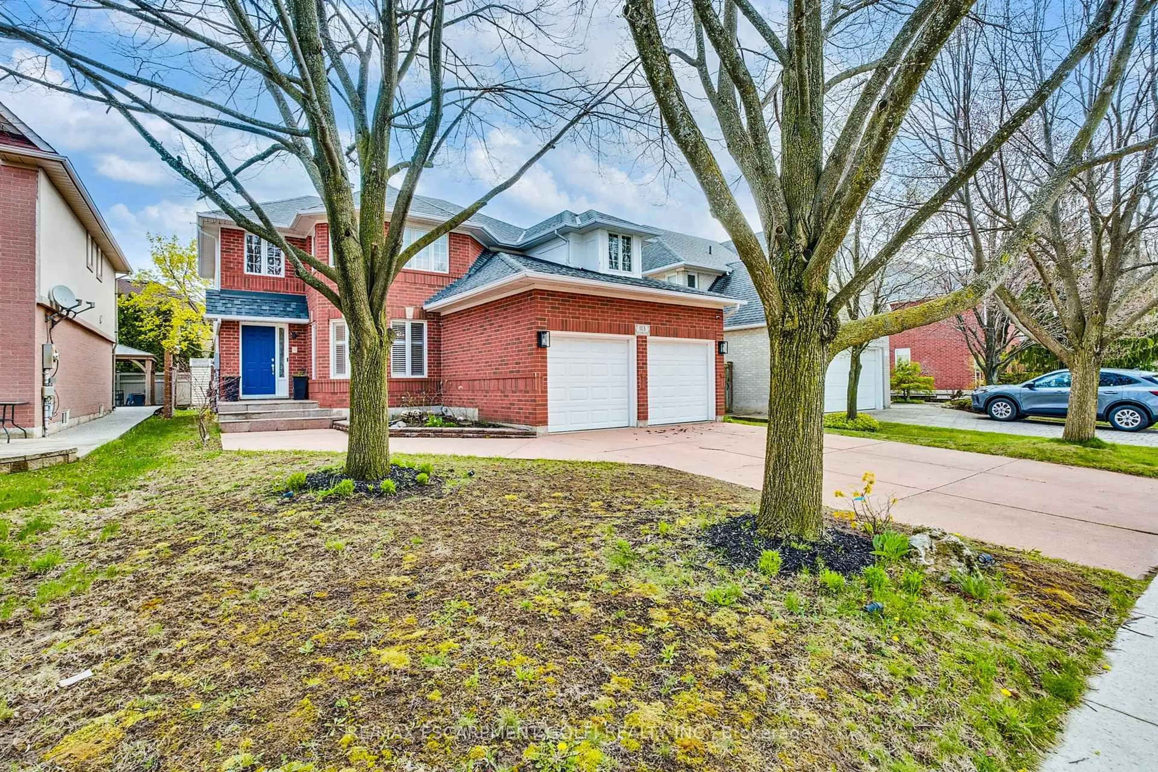 Home with brick exterior material, street for 113 Meadowlands Blvd, Hamilton Ontario L9K 1H8