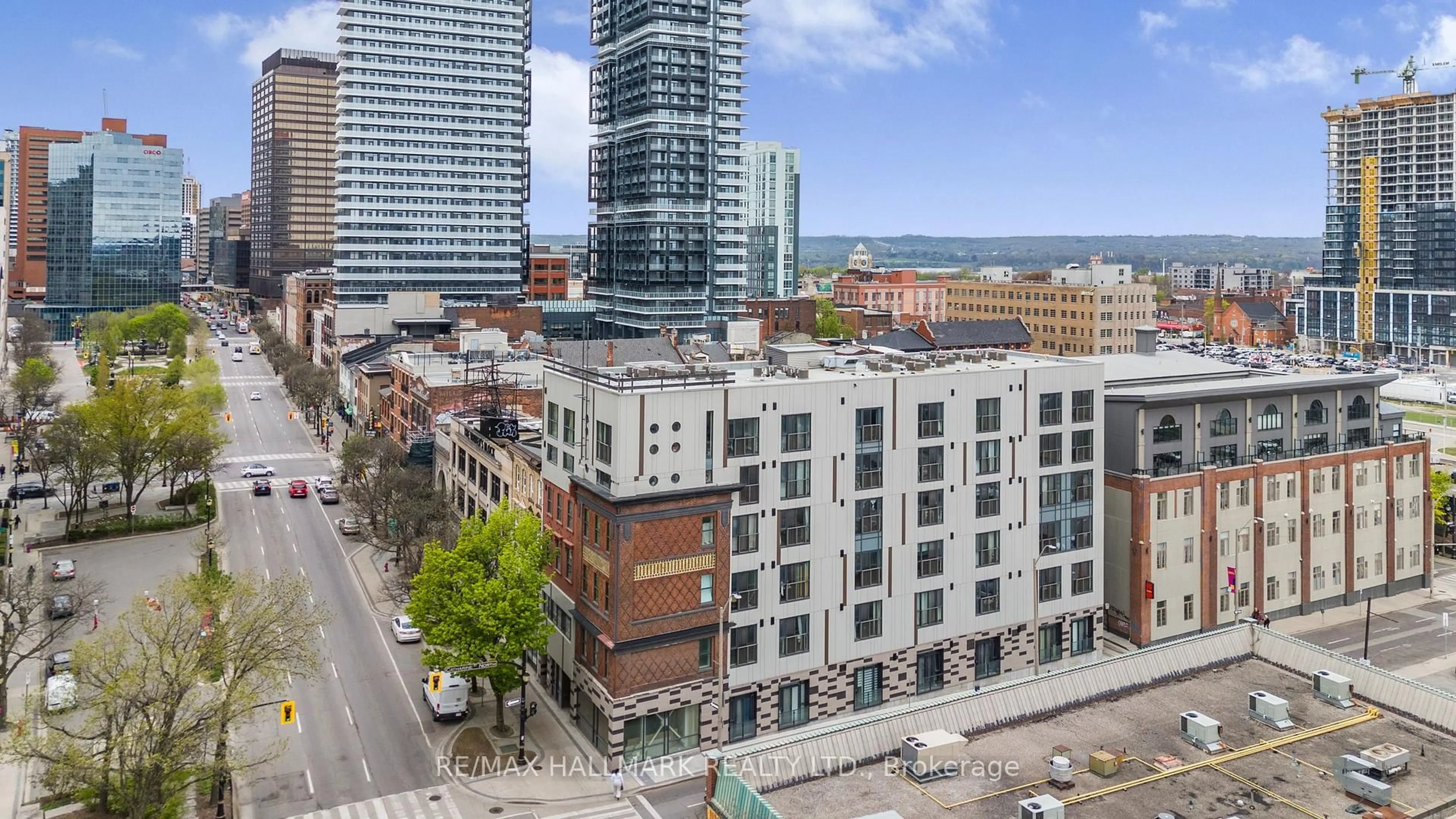 A pic from outside/outdoor area/front of a property/back of a property/a pic from drone, city buildings view from balcony for 121 KING St #308, Hamilton Ontario L8N 1A9