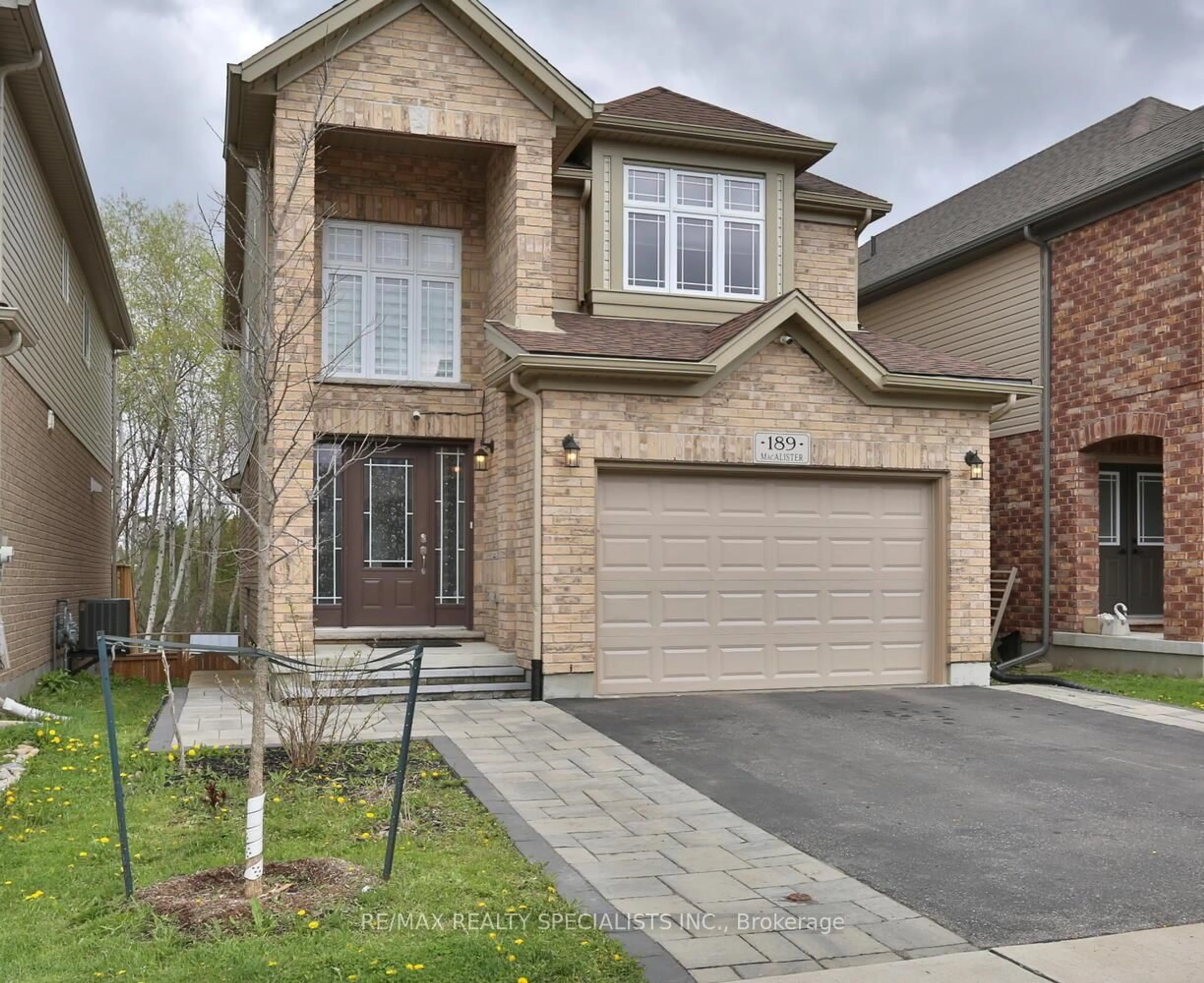Home with brick exterior material, street for 189 MACALISTER Blvd, Guelph Ontario N1G 0G7