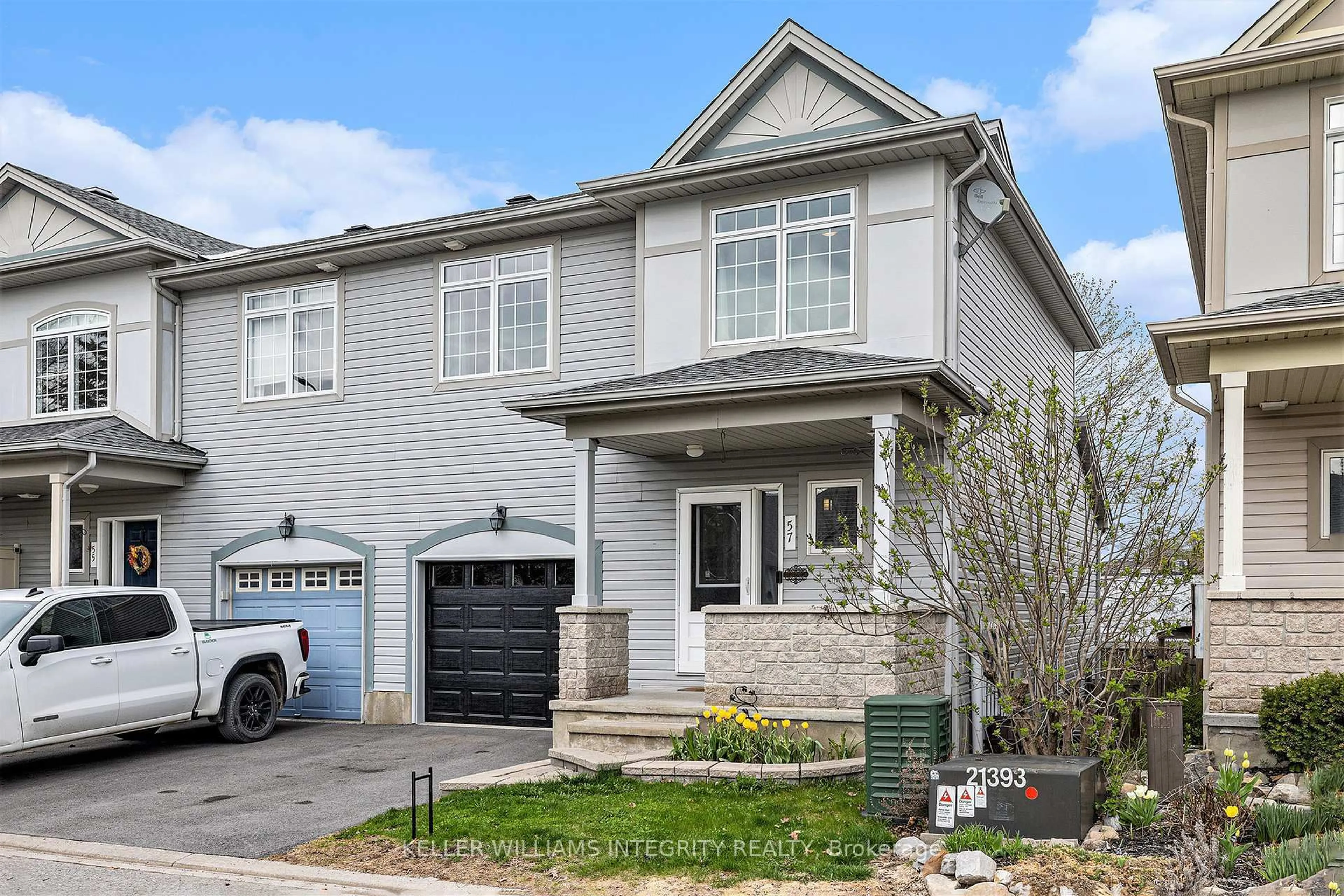 Home with brick exterior material, street for 57 Village Walk Private, Manotick Ontario K4M 1L1