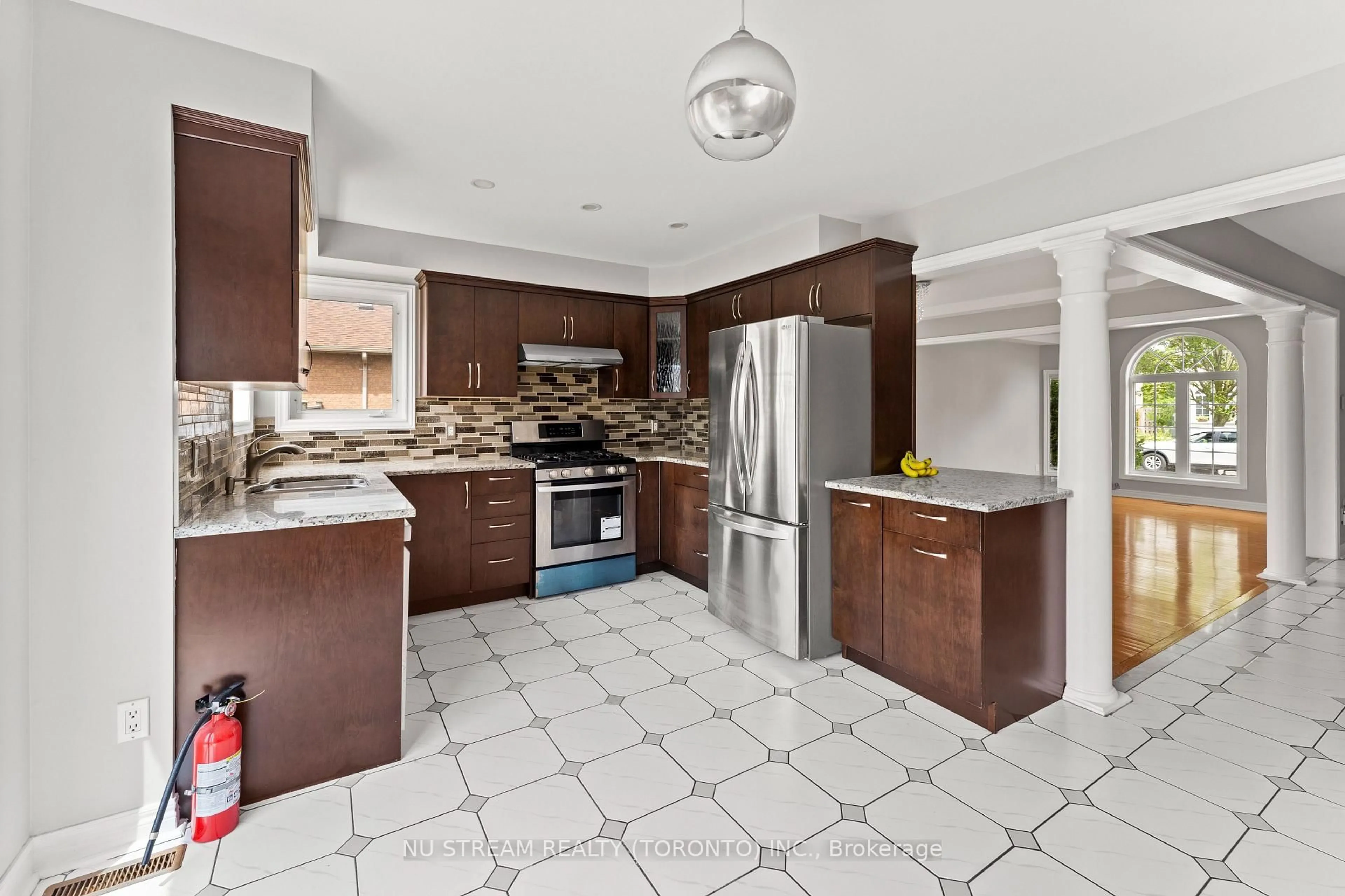 Open concept kitchen, ceramic/tile floor for 4629 Tournament Crt, Windsor Ontario N9G 2P8