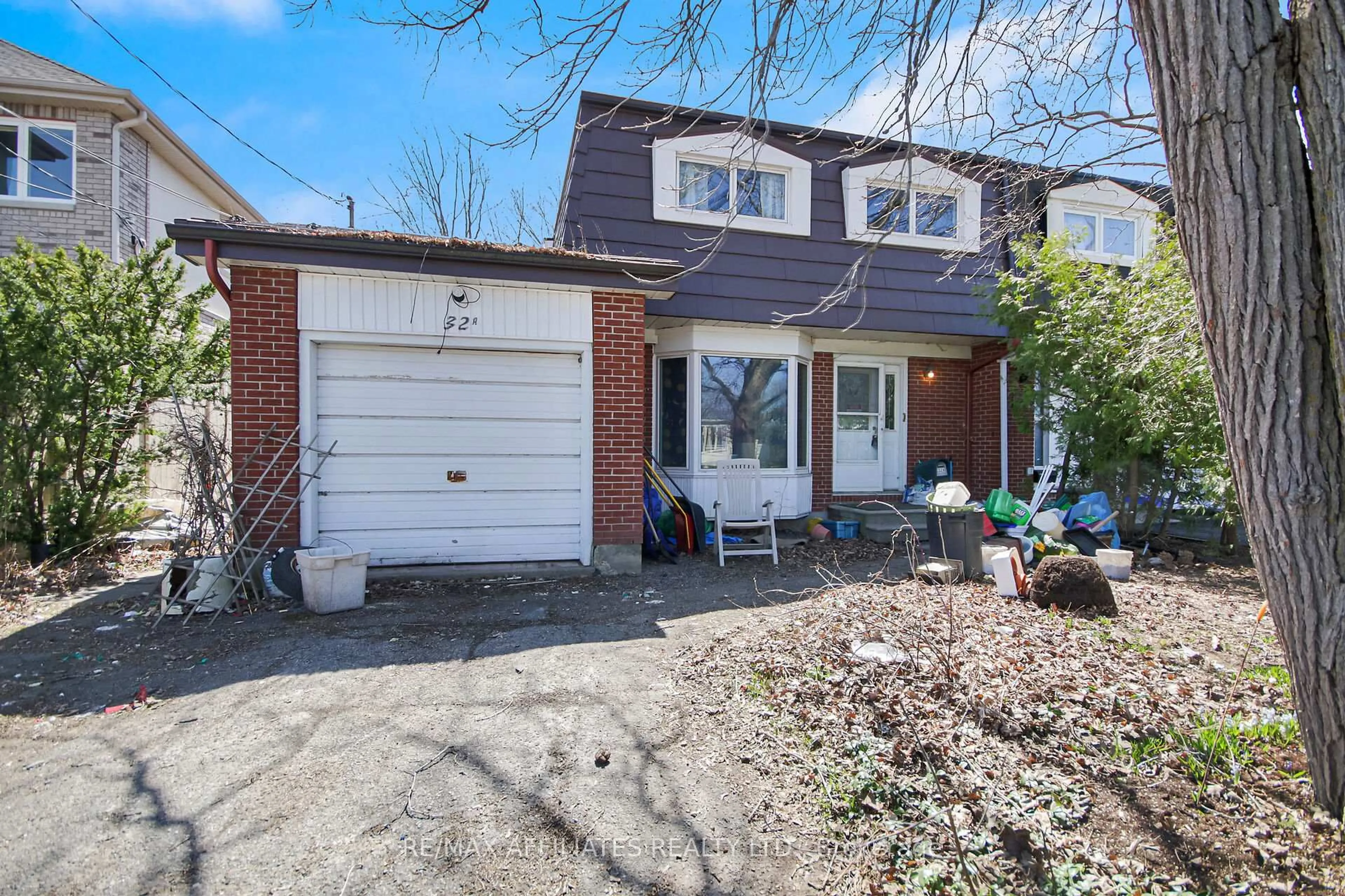 Home with brick exterior material, street for 32A Ashburn Dr, Ottawa Ontario K2E 6N3