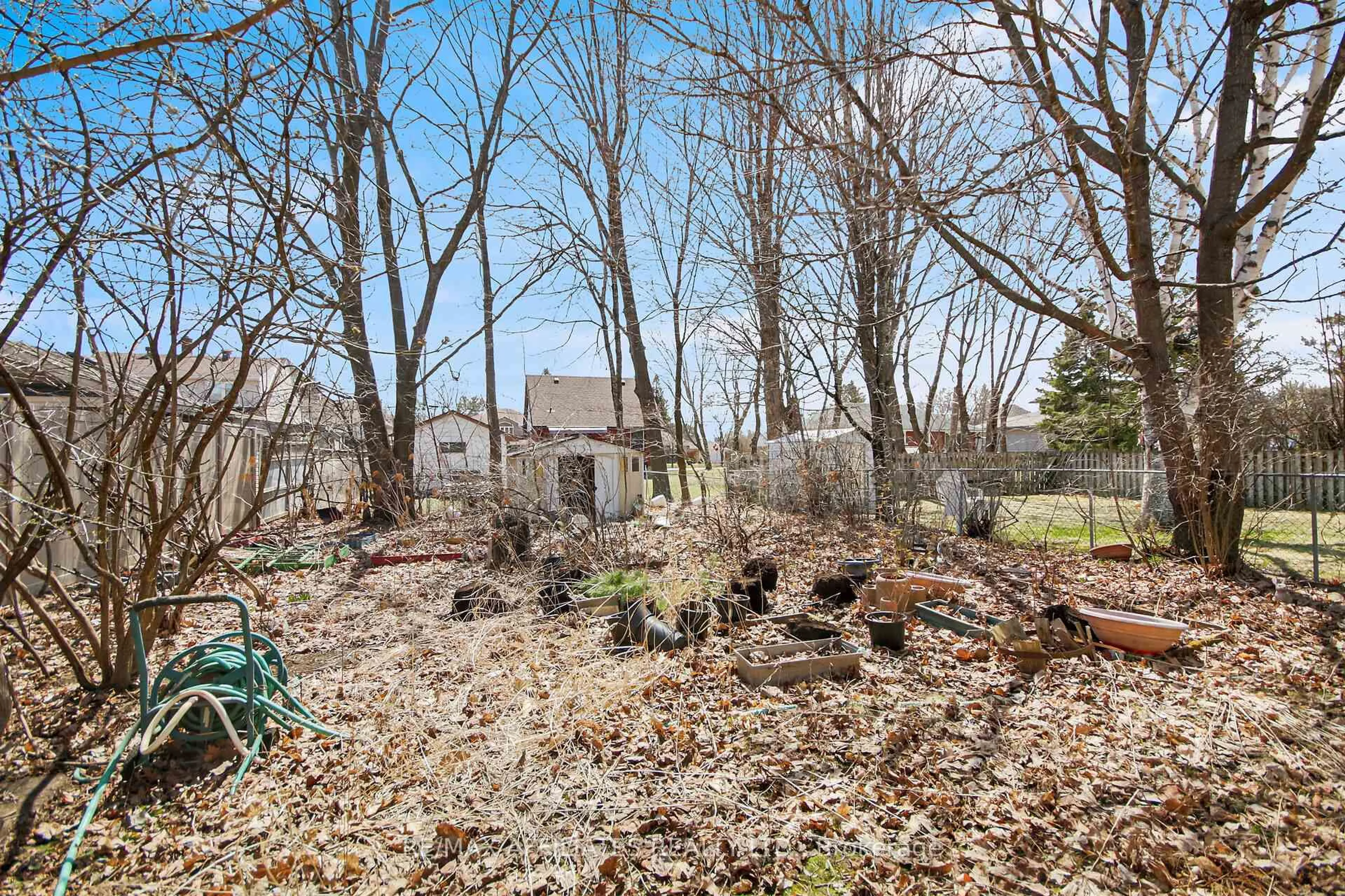 Patio, forest/trees view for 32A Ashburn Dr, Ottawa Ontario K2E 6N3