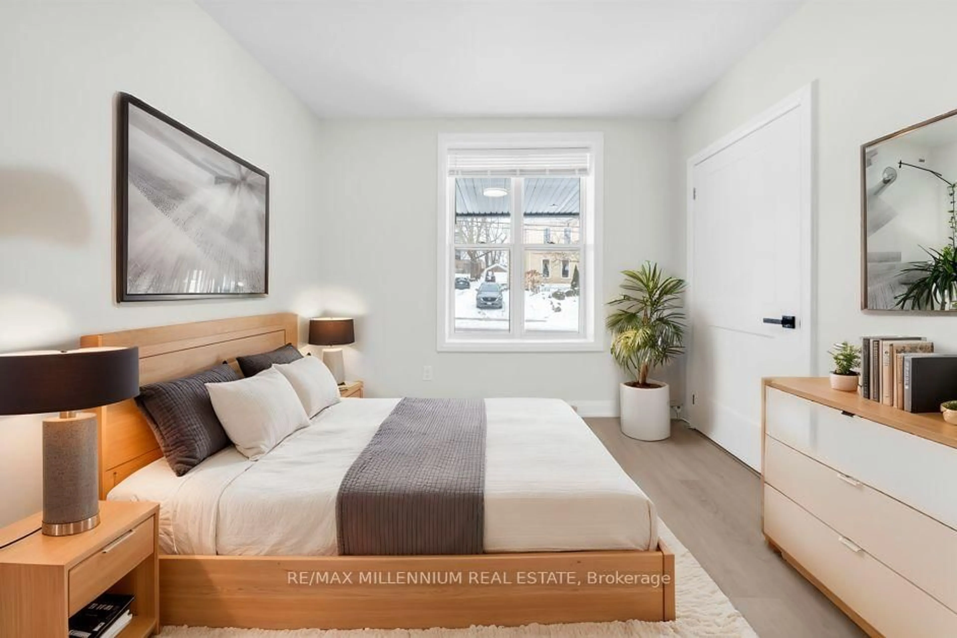 Bedroom with bed, wood/laminate floor for 124 Church St, Kitchener Ontario N2G 2S4