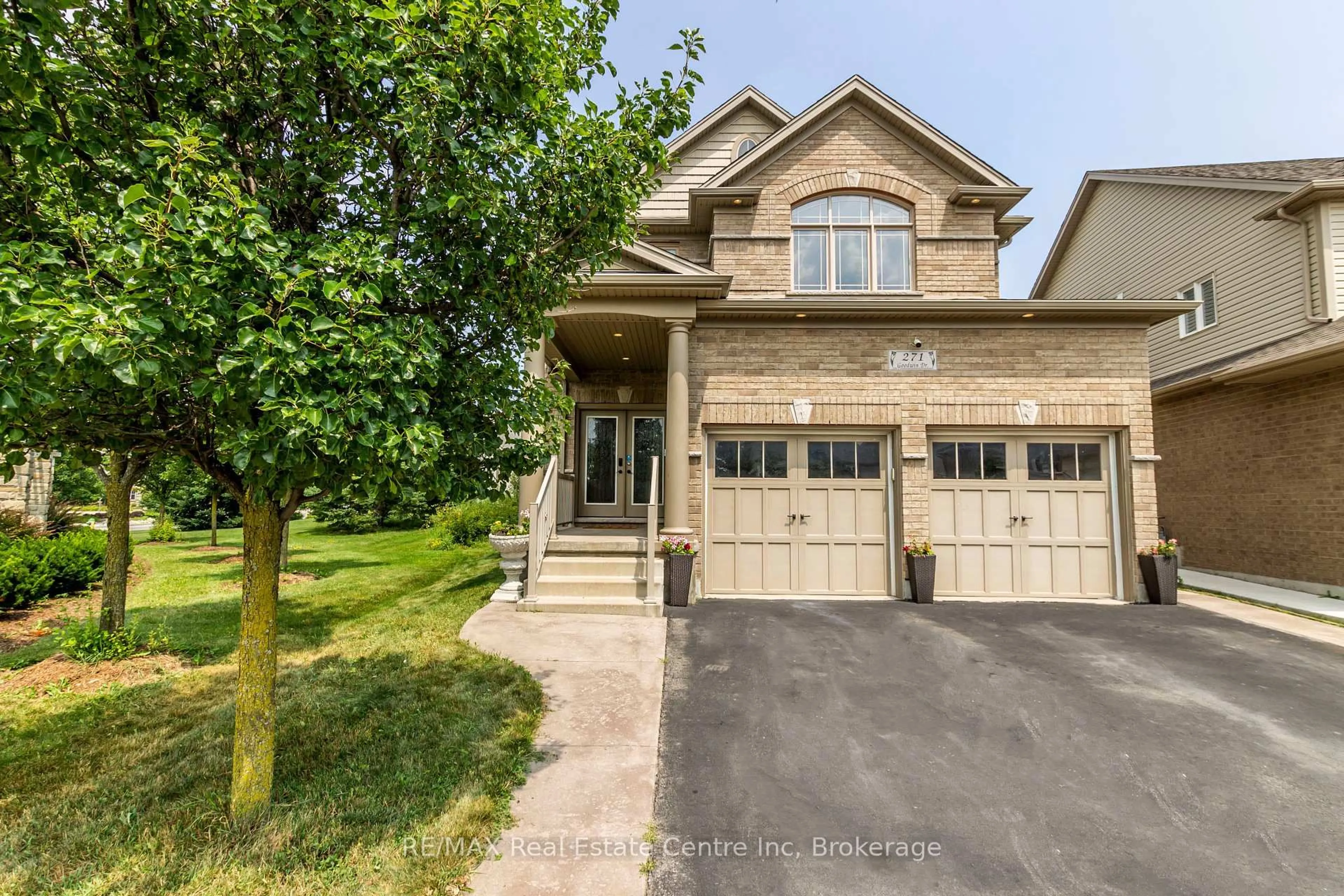 Home with brick exterior material, street for 271 Goodwin Dr, Guelph Ontario N1L 1C3