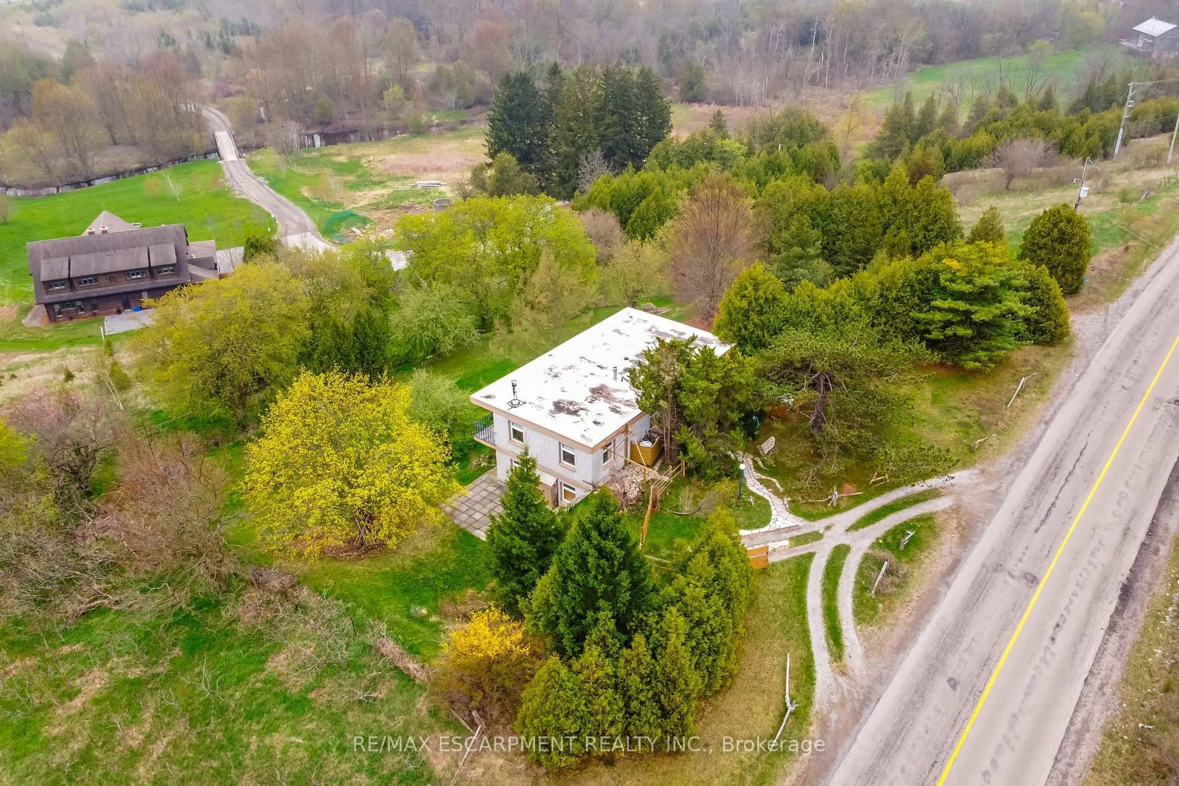 A pic from outside/outdoor area/front of a property/back of a property/a pic from drone, unknown for 754 8th Concession Rd, Hamilton Ontario N0B 2J0