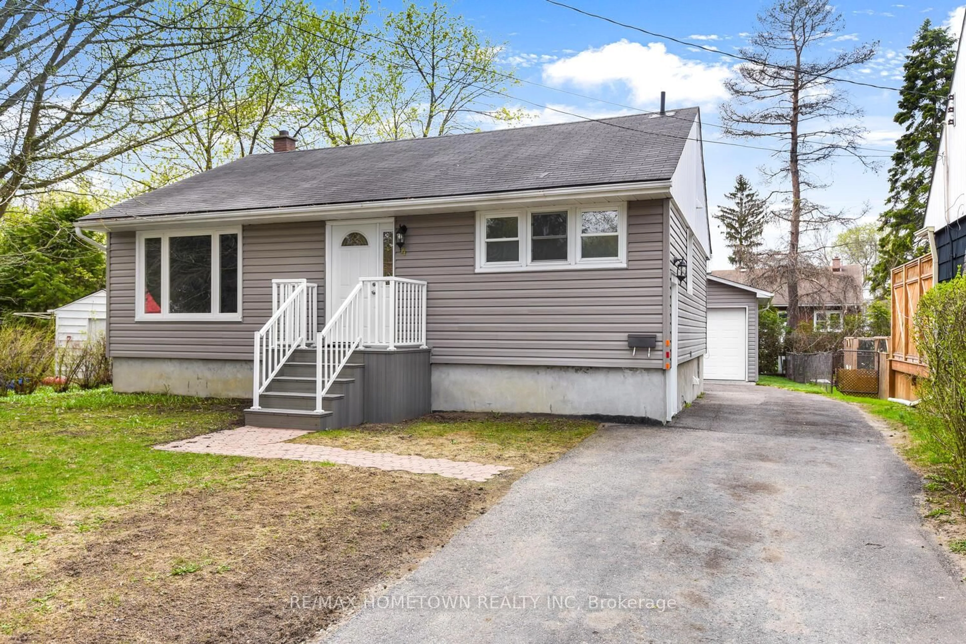 Home with vinyl exterior material, street for 4 Otter Dr, Brockville Ontario K6V 5R7