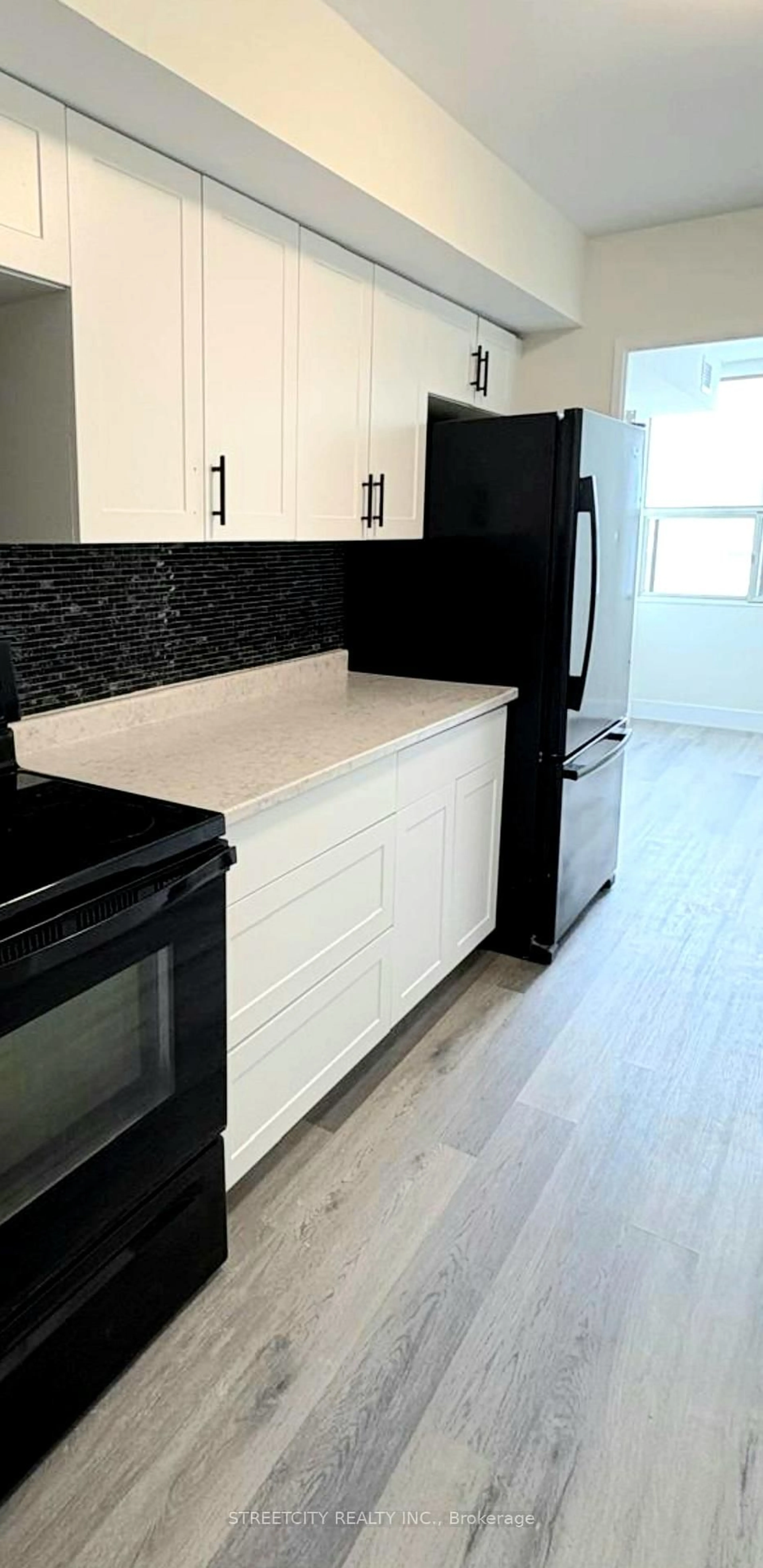 Standard kitchen, ceramic/tile floor for 380 King St #1207, London East Ontario N6B 3L6
