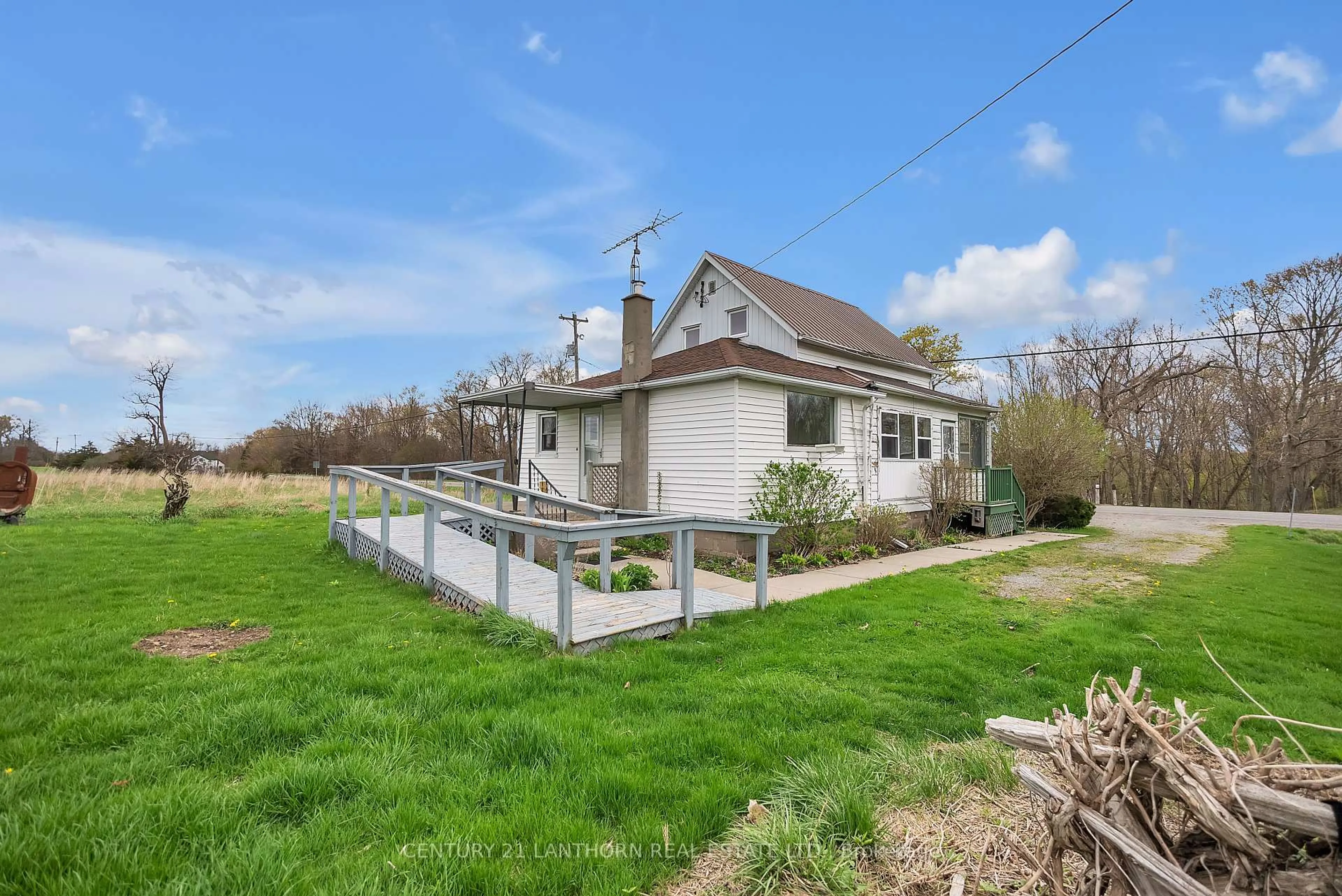 A pic from outside/outdoor area/front of a property/back of a property/a pic from drone, street for 1205 County Road 18 Rd, Prince Edward County Ontario K0K 1P0