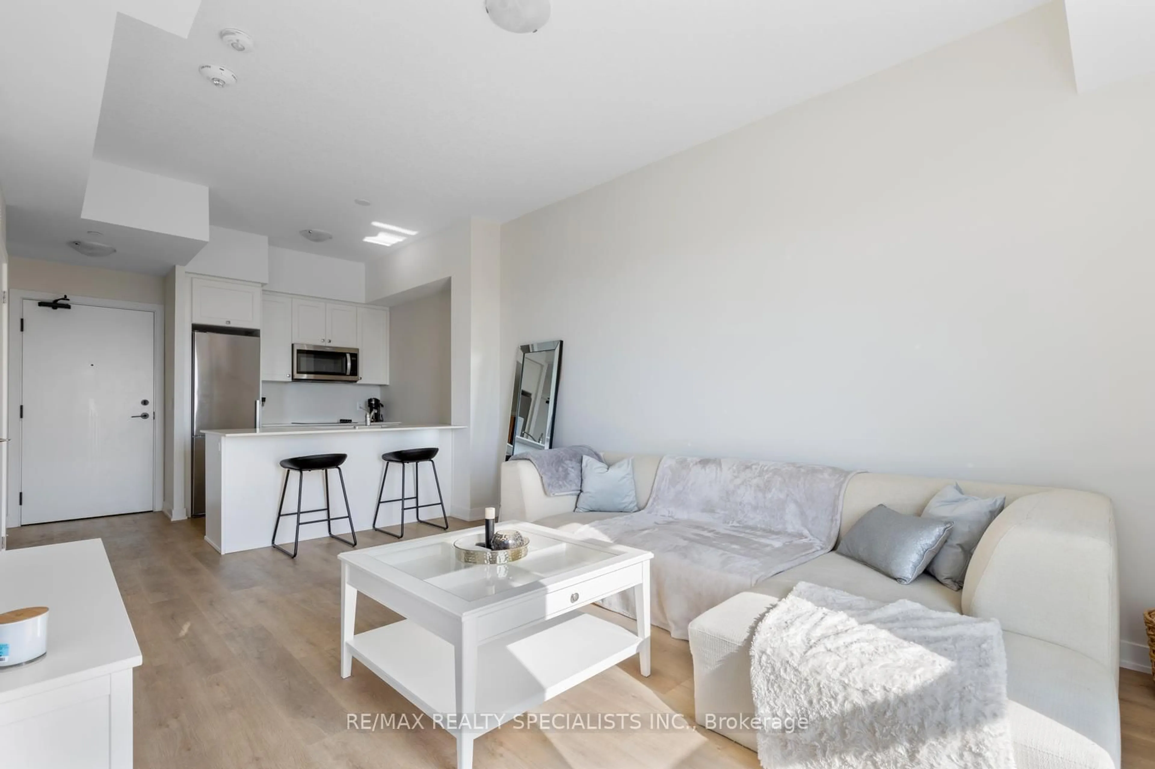 Living room with furniture, unknown for 600 North Service Rd #619, Hamilton Ontario L8E 0L2
