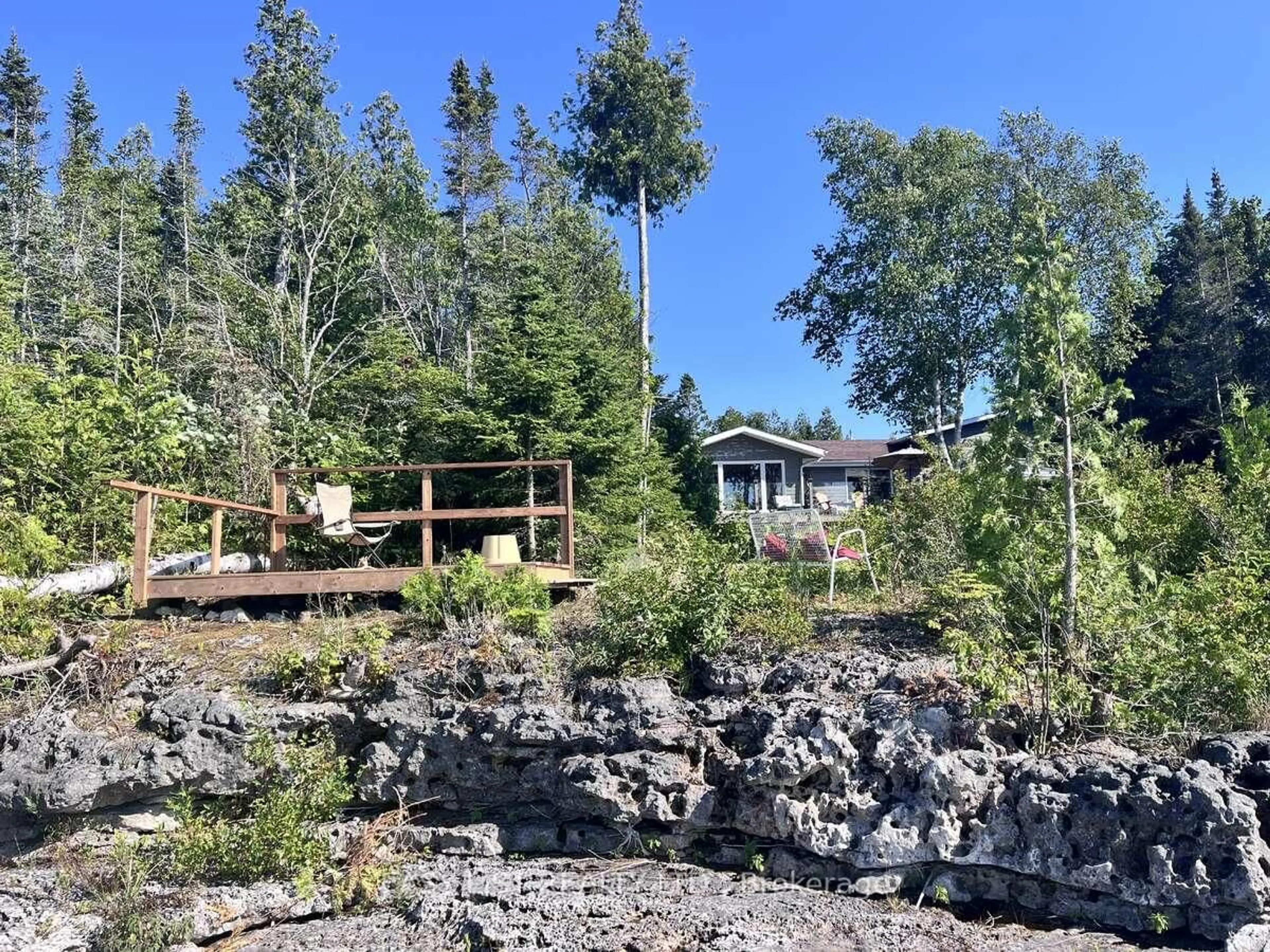 A pic from outside/outdoor area/front of a property/back of a property/a pic from drone, unknown for 62 Zorra Dr, Northern Bruce Peninsula Ontario N0H 2R0